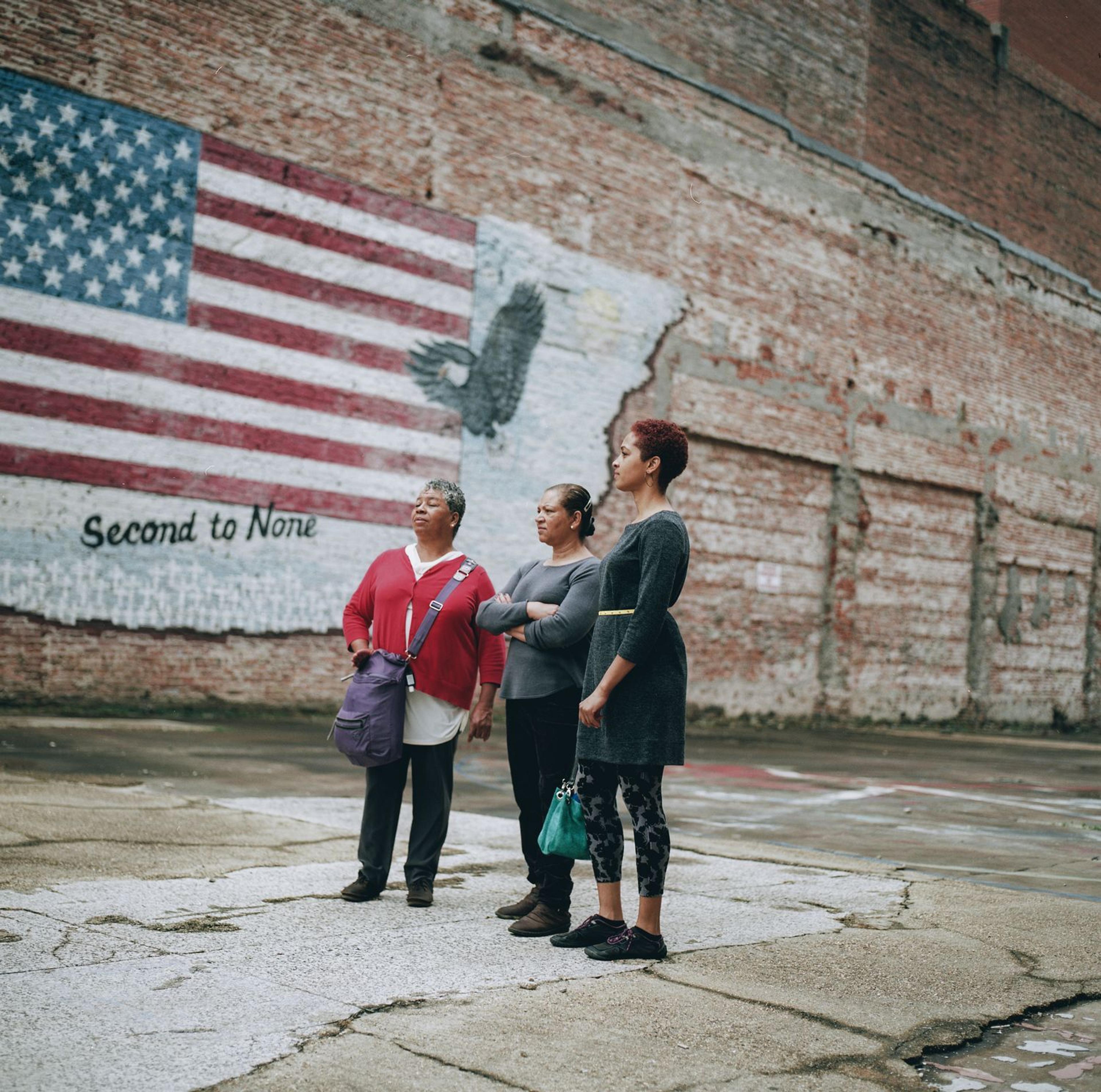 Shirah Dedman, Phoebe Dedman, and Luz Myles visiting Shreveport, Louisiana, where in 1912 their relative Thomas Miles, Sr., was lynched. 2017. (Photo: Rog Walker and Bee Walker for the Equal Justice Initiative)