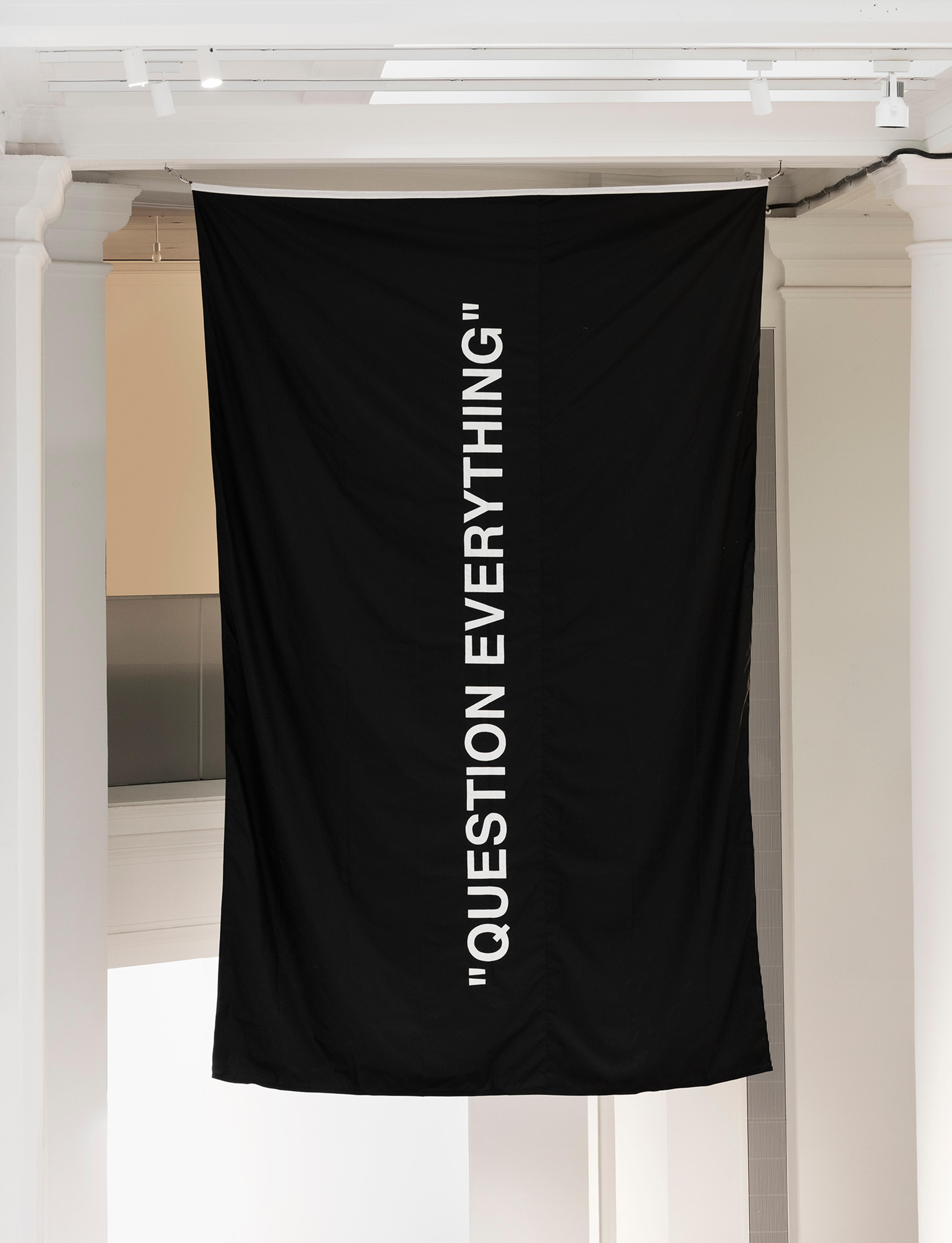 Virgil Abloh (Rockford, Illinois, 1980–2021, Chicago, Illinois). “PSA,” 2019. Nylon flag, 15 × 11 ft. (457.2 × 335.3 cm). Courtesy of Gymnastics Art Institute & Virgil Abloh Securities. (Photo: © Gymnastics Art Institute)