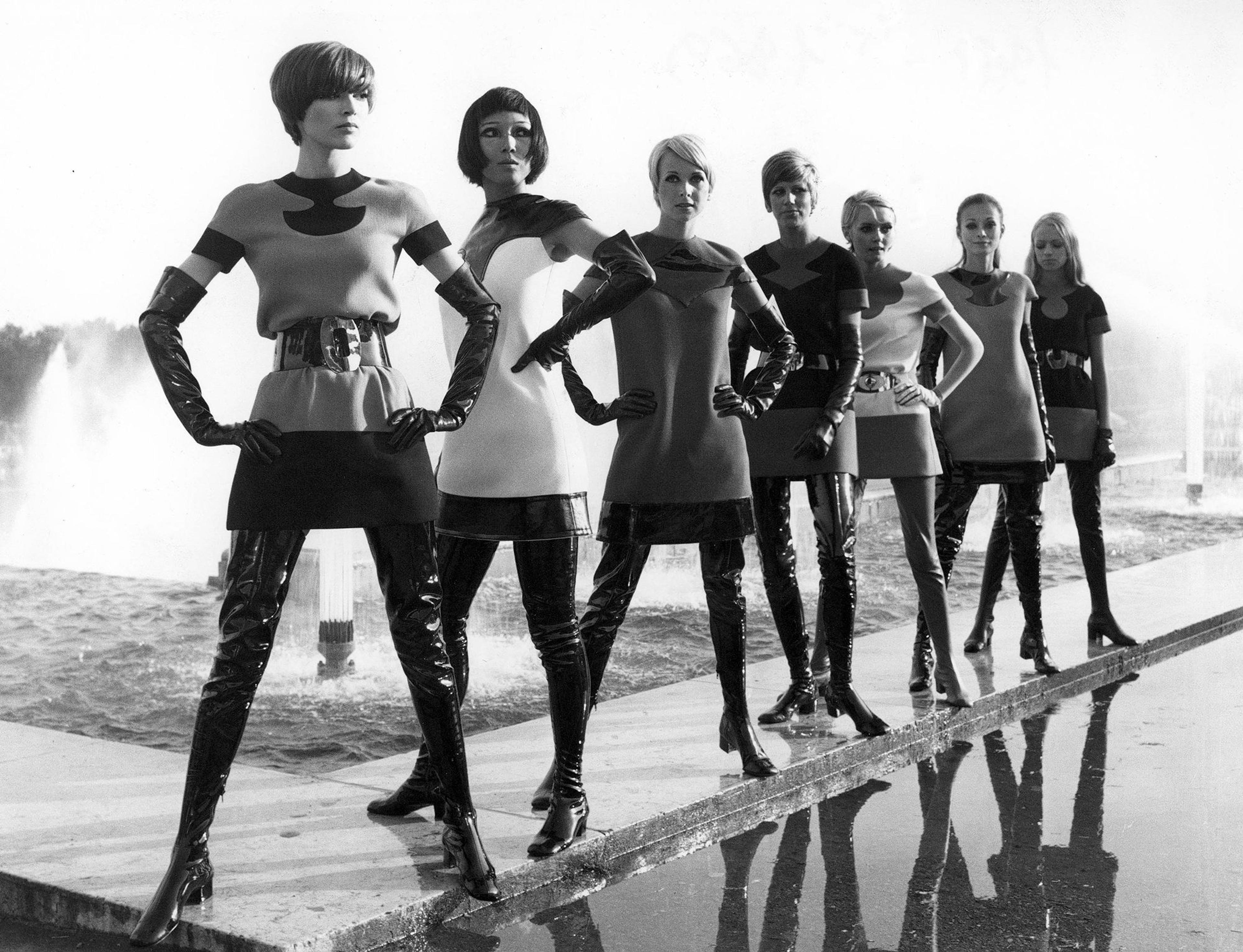 Pierre Cardin two-tone jersey dresses, with vinyl waders, 1969. (Photo: Yoshi Takata. © Pierre Pelegry)