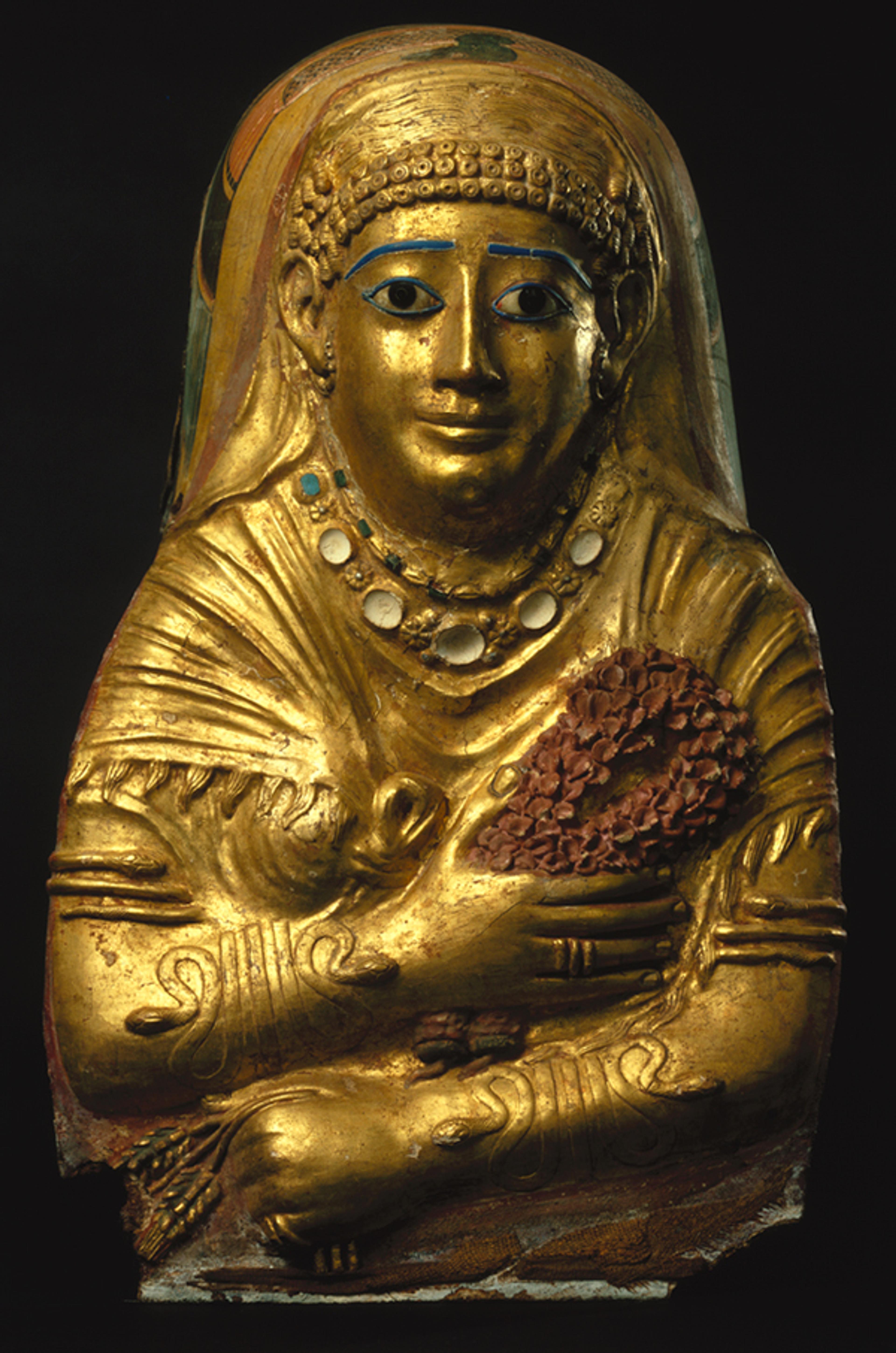 <i>Mummy Cartonnage of a Woman</i>, 1st century C.E. Linen, gesso, gold leaf, glass, faience. Brooklyn Museum; Charles Edwin Wilbour Fund, 69.35. (Photo: Brooklyn Museum)