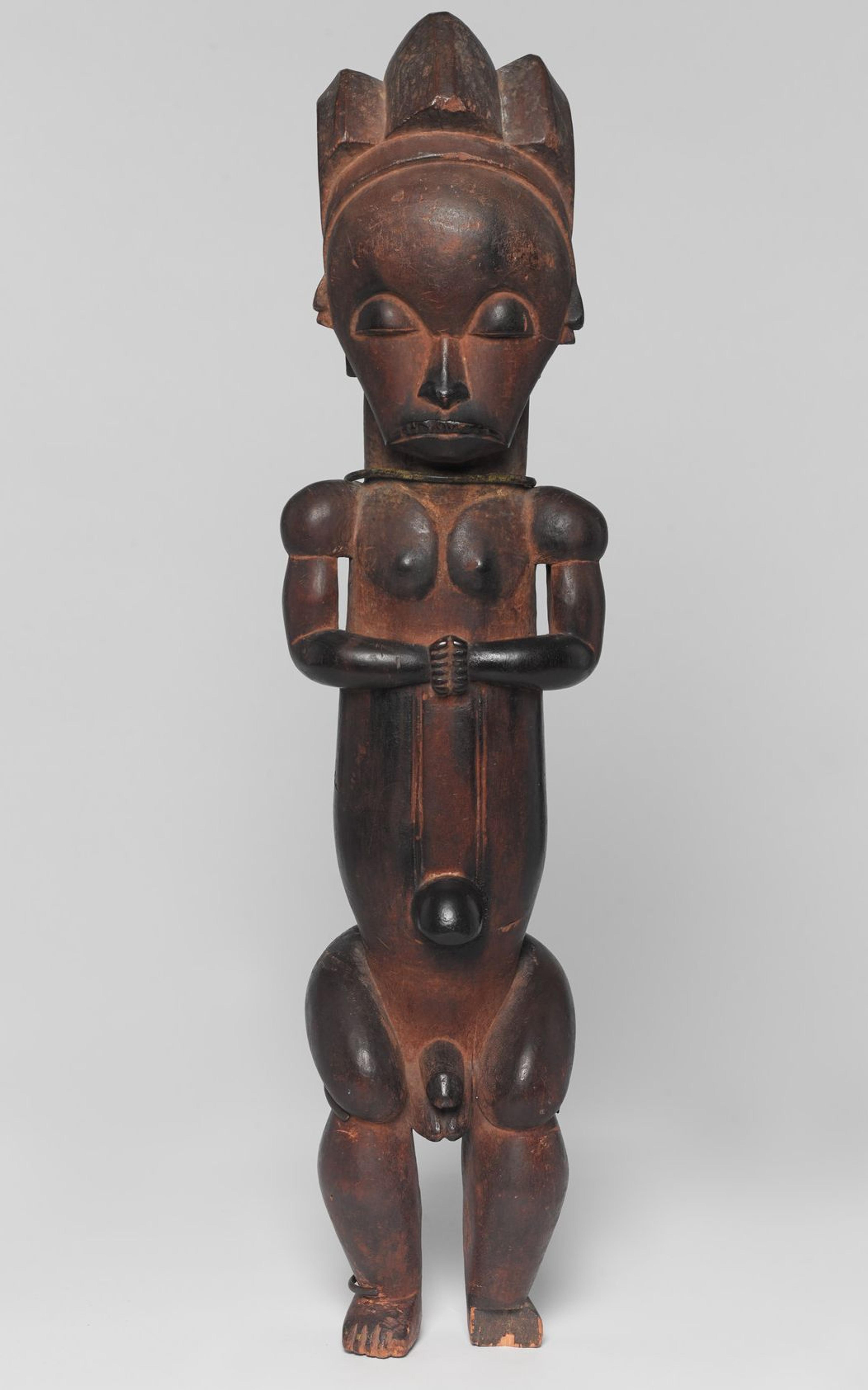 An Ntem River Valley Master (Fang peoples, Mvaï subgroup). Reliquary Guardian Figure (Eyema-o-Byeri), circa 1750–1860. Wood, iron, 23 × 53/4 × 5 in. (58.4 × 14.6 × 12.7 cm). Brooklyn Museum; Frank L. Babbott Fund, 51.3. (Photo: Brooklyn Museum)