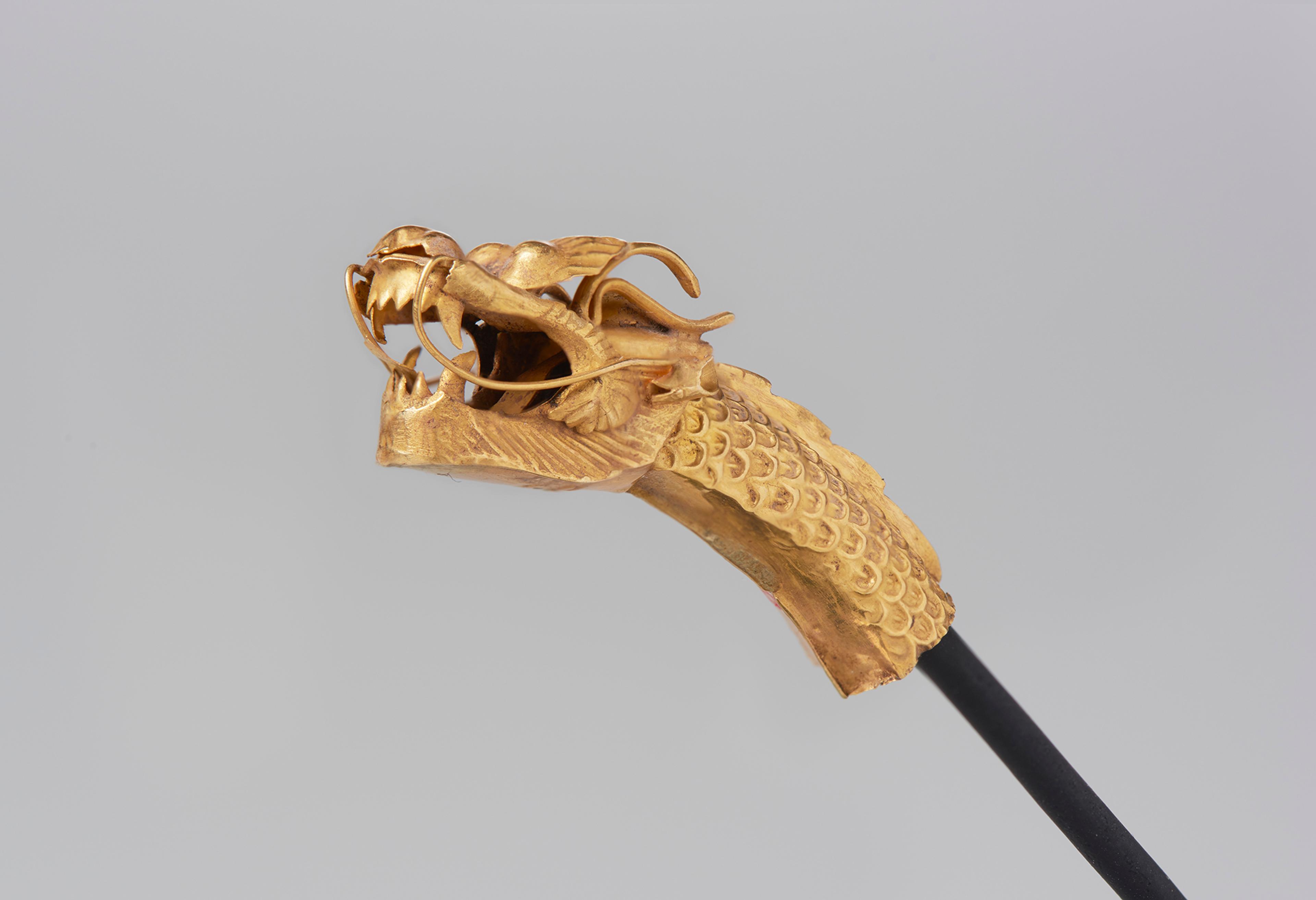 Finial in the Shape of a Dragon Head. Korea, Goryeo dynasty, 14th century. Gold, 15/8 x 1/2 x 1/4 in. (4.2 x 1.2 x 0.8 cm). Brooklyn Museum, Purchase gift of Mr. and Mrs. A. B. Martin, 84.36. (Photo: Jonathan Dorado, Brooklyn Museum)