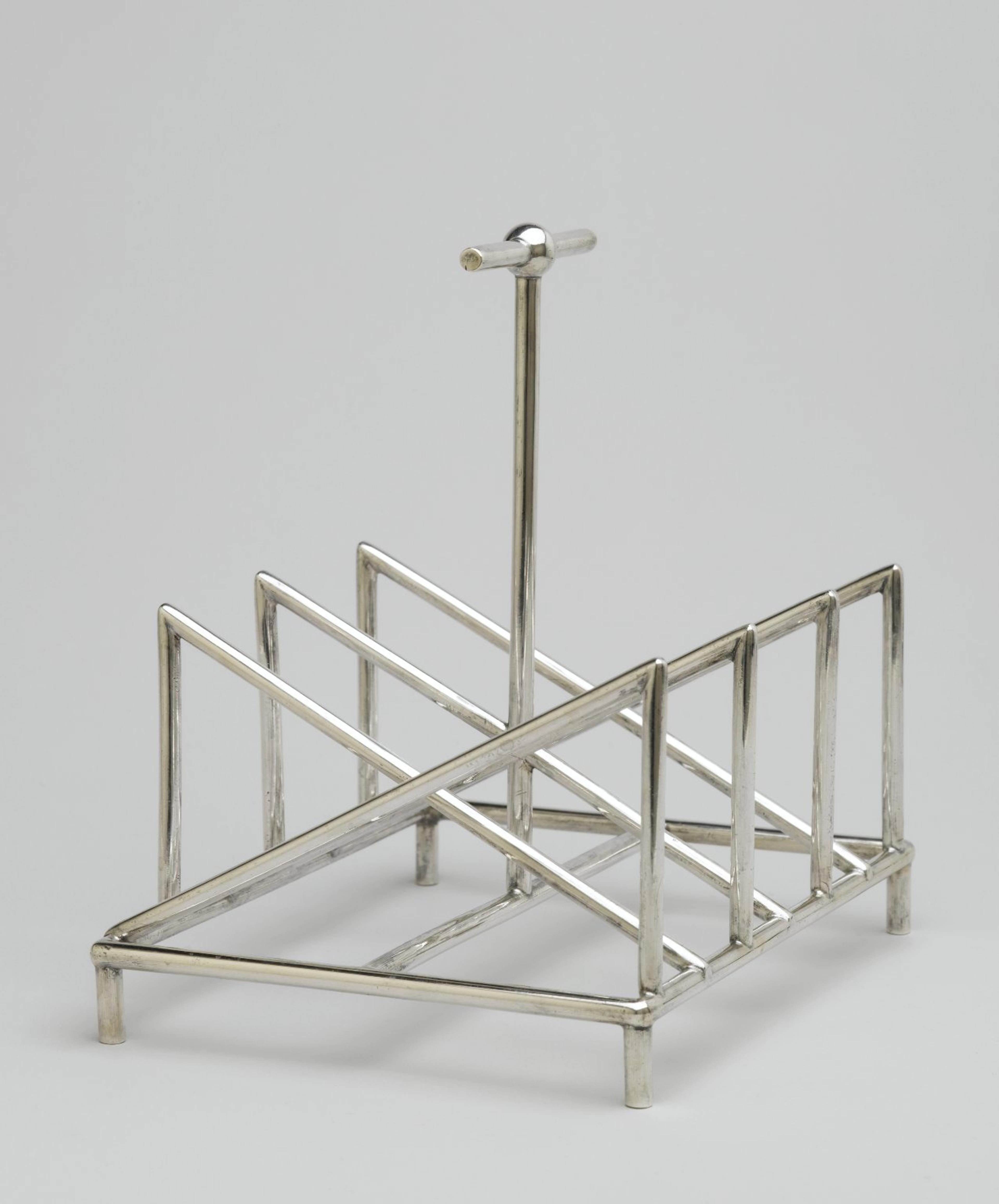 Christopher Dresser (English, 1834–1904). Toast Rack, circa 1880. Silver, 53⁄8 x 51⁄4 x 41⁄4 in. (13.7 × 13.3 × 10.8 cm). Manufactured by Tiffany &amp; Company (New York, active 1853–present). Brooklyn Museum, Gift of Marie Bernice Bitzer, by exchange, 1997.114