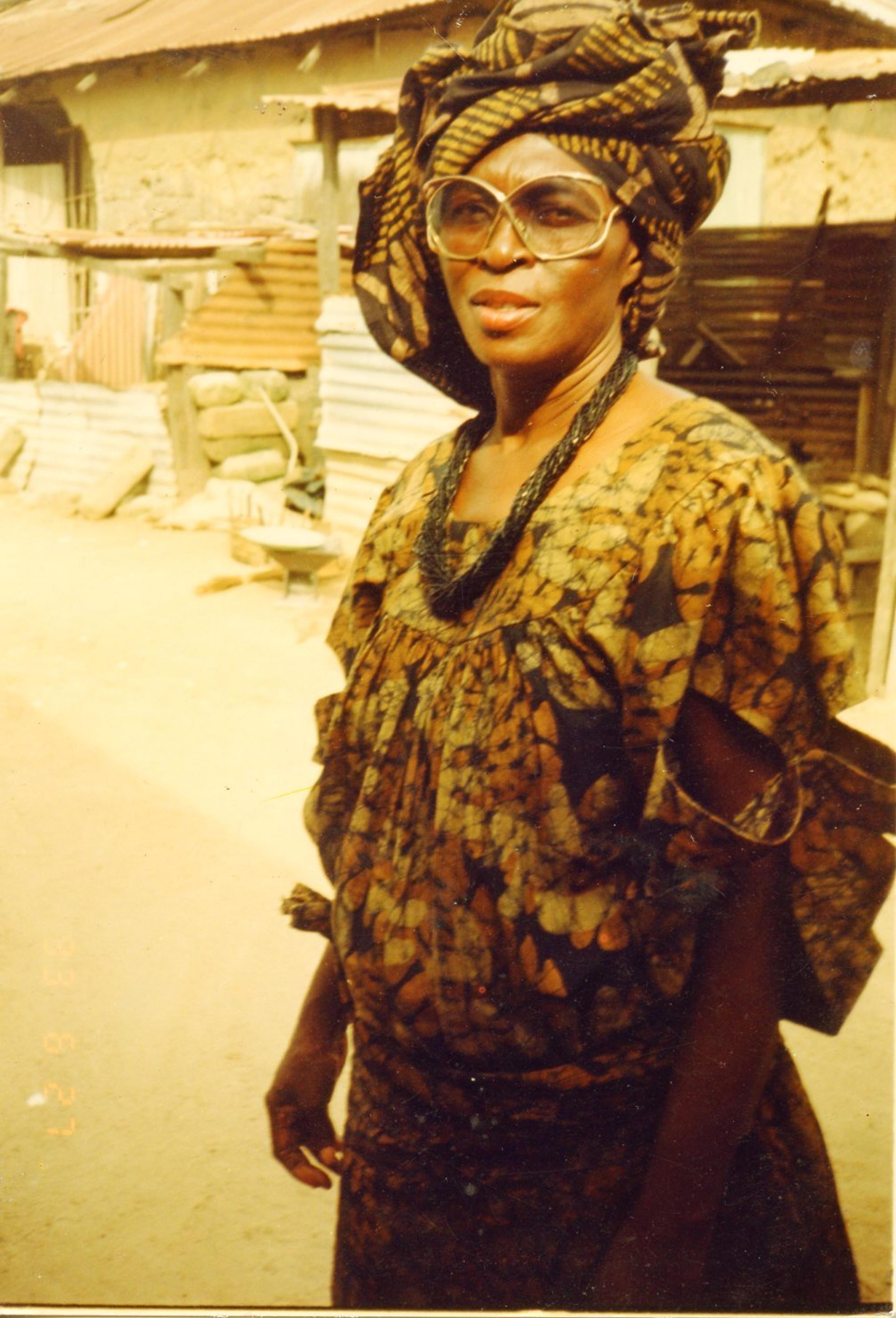 Aunty Mercy Asi Ocansey, a famous Accra artist and textile designer wearing her own designs, circa 1990s. Photo courtesy of The McKinley Collection.