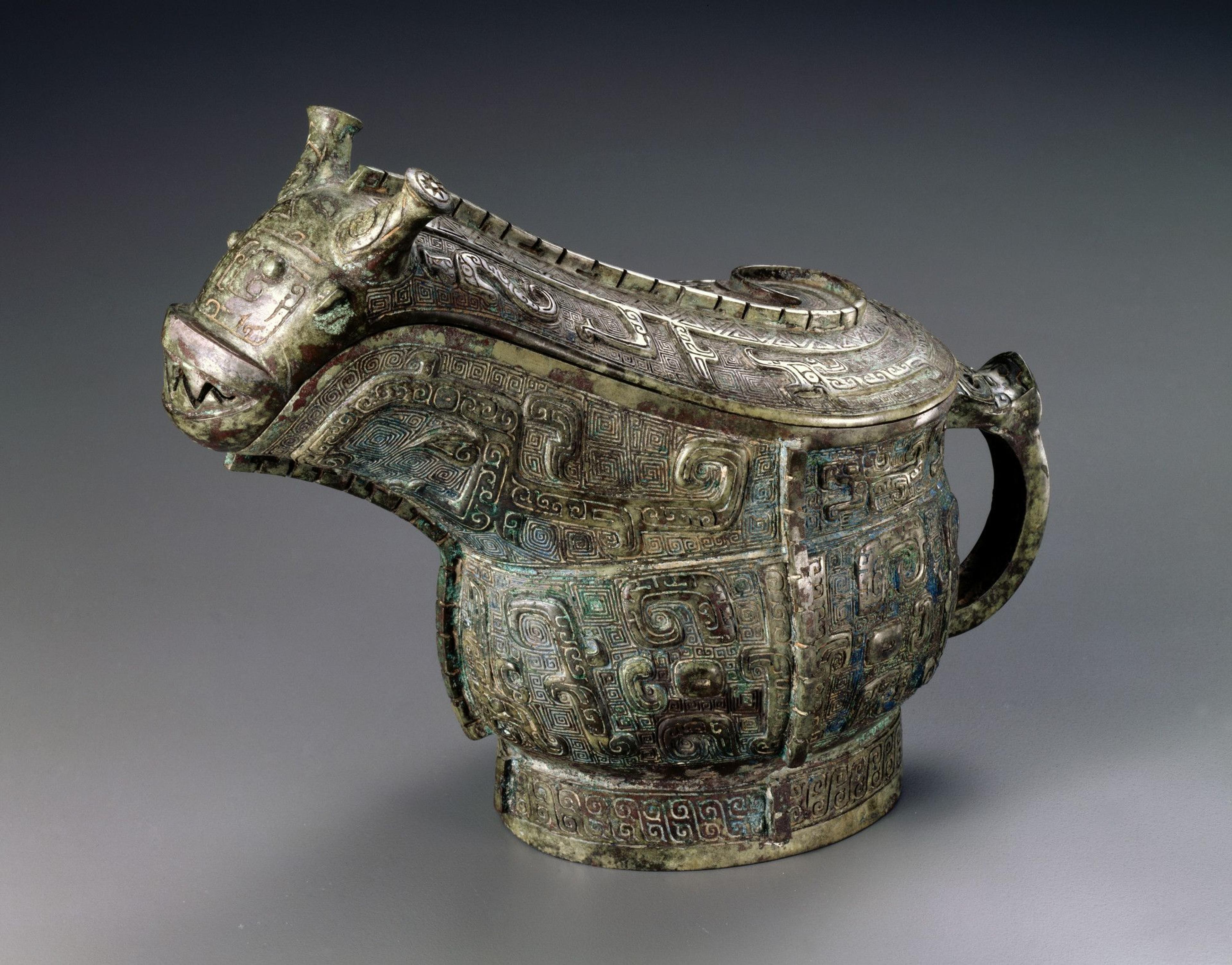 Ritual Wine Vessel (Guang). China, late Shang dynasty, 13th–11th century B.C.E. Bronze, 6 1/2 × 3 1/4 × 8 1/2 in. (16.5 × 8.3 × 21.6 cm). Brooklyn Museum; Gift of Mr. and Mrs. Alastair B. Martin, the Guennol Collection, 72.163a-b. (Photo: Brooklyn Museum)