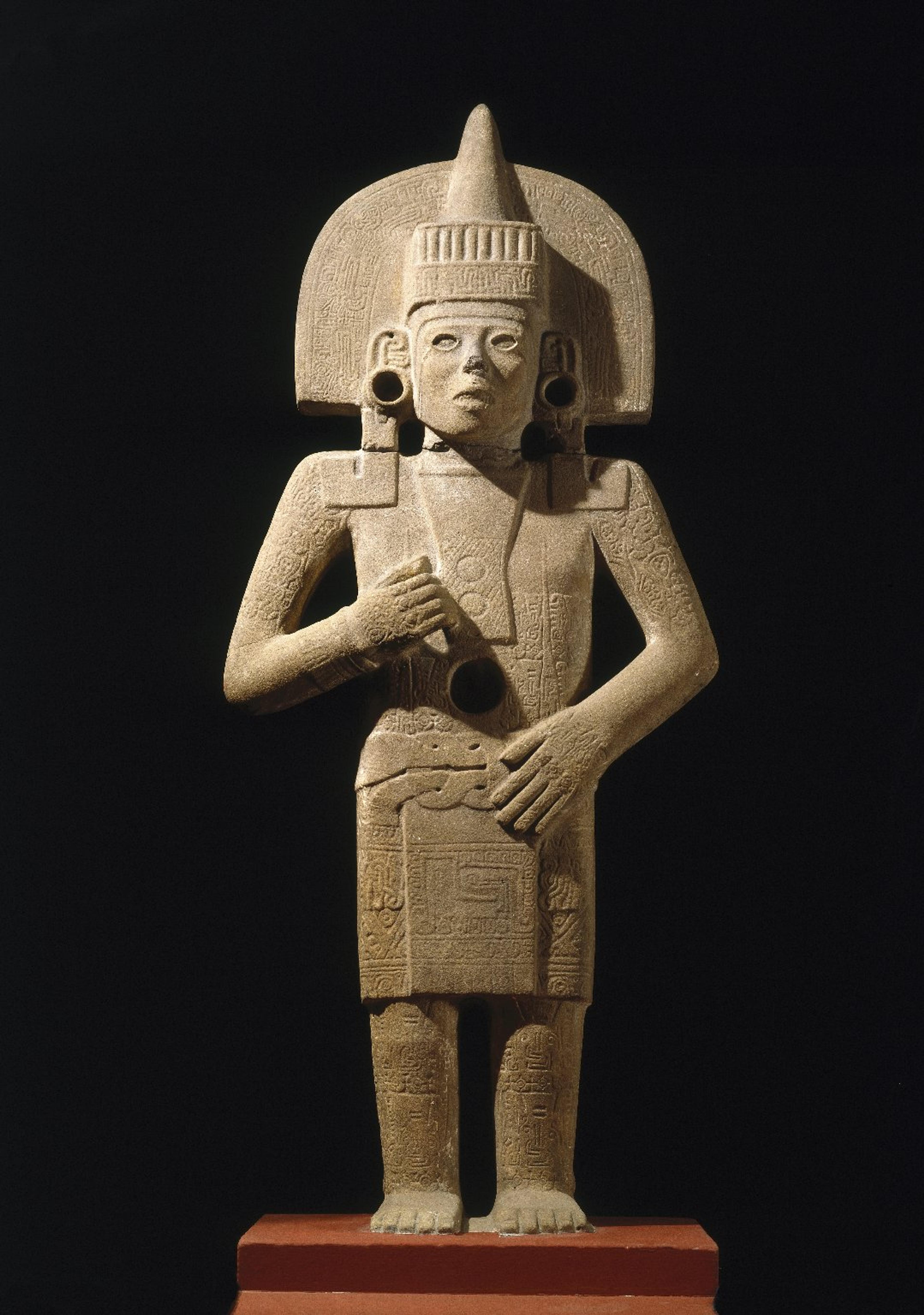 Huastec artist. Life-Death Figure, 900–1250. Possibly found at the site of Chilitujú near San Vicente Tancuayalab, San Luis Potosí, Mexico. Sandstone, traces of pigment, 623⁄8 x 26 × 111⁄2 in. (158.4 × 66 × 29.2 cm). Brooklyn Museum, Frank Sherman Benson Fund and the Henry L. Batterman Fund, 37.2897PA