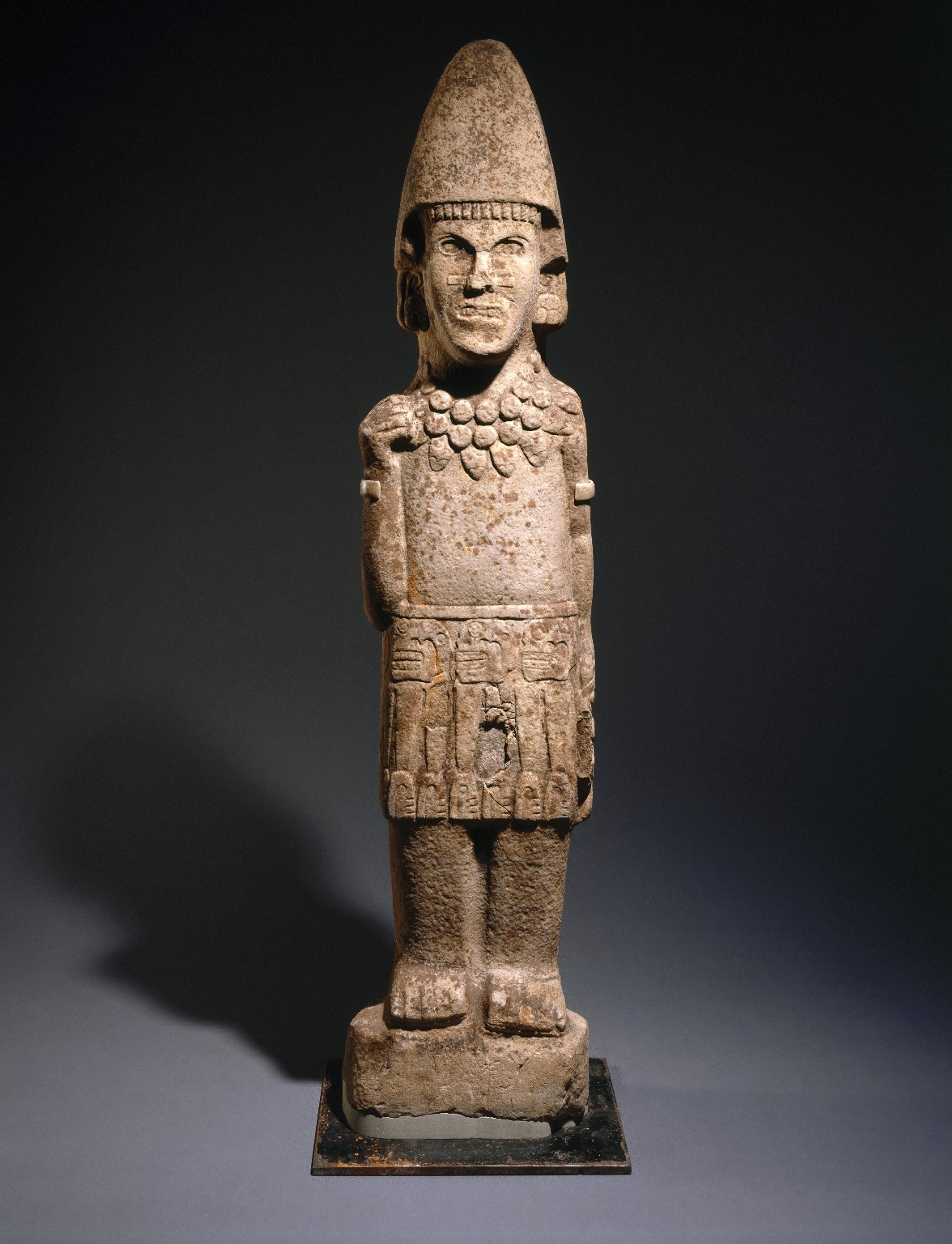 Huastec. Warrior Figure, 13th or 14th century. Sandstone, 653⁄16 x 143⁄4 x 71⁄2 in. (165.6 × 37.5 × 19.1 cm). Brooklyn Museum, Frank L. Babbott Fund, 39.371