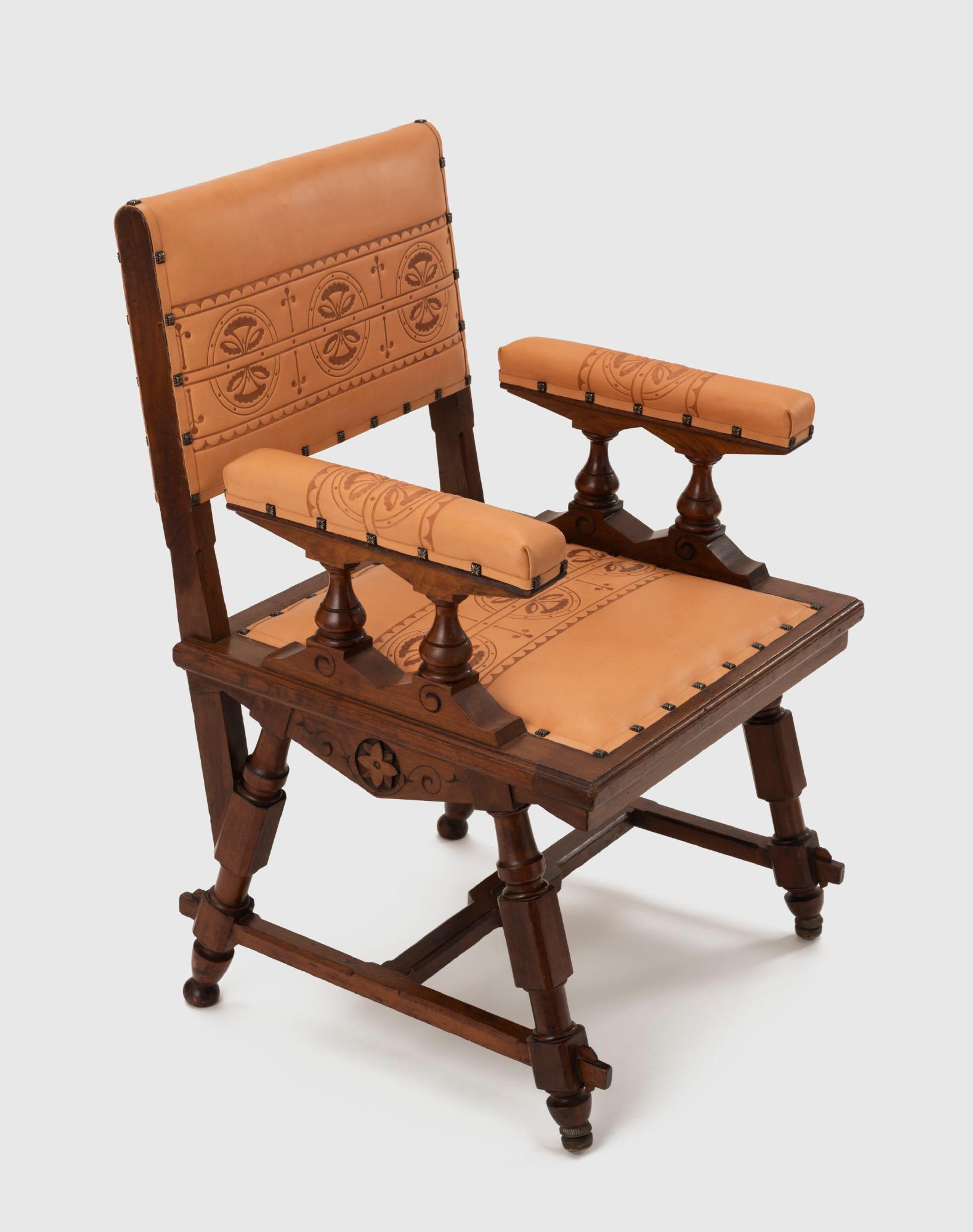 Kimbel and Cabus (New York, 1863–82). Armchair, circa 1875. American black walnut, leather, 355/8 × 23 × 233/4 in. (90.5 × 58.4 × 60.3 cm). Collection of Andrew VanStyn. (Photo: Mitro Hood)