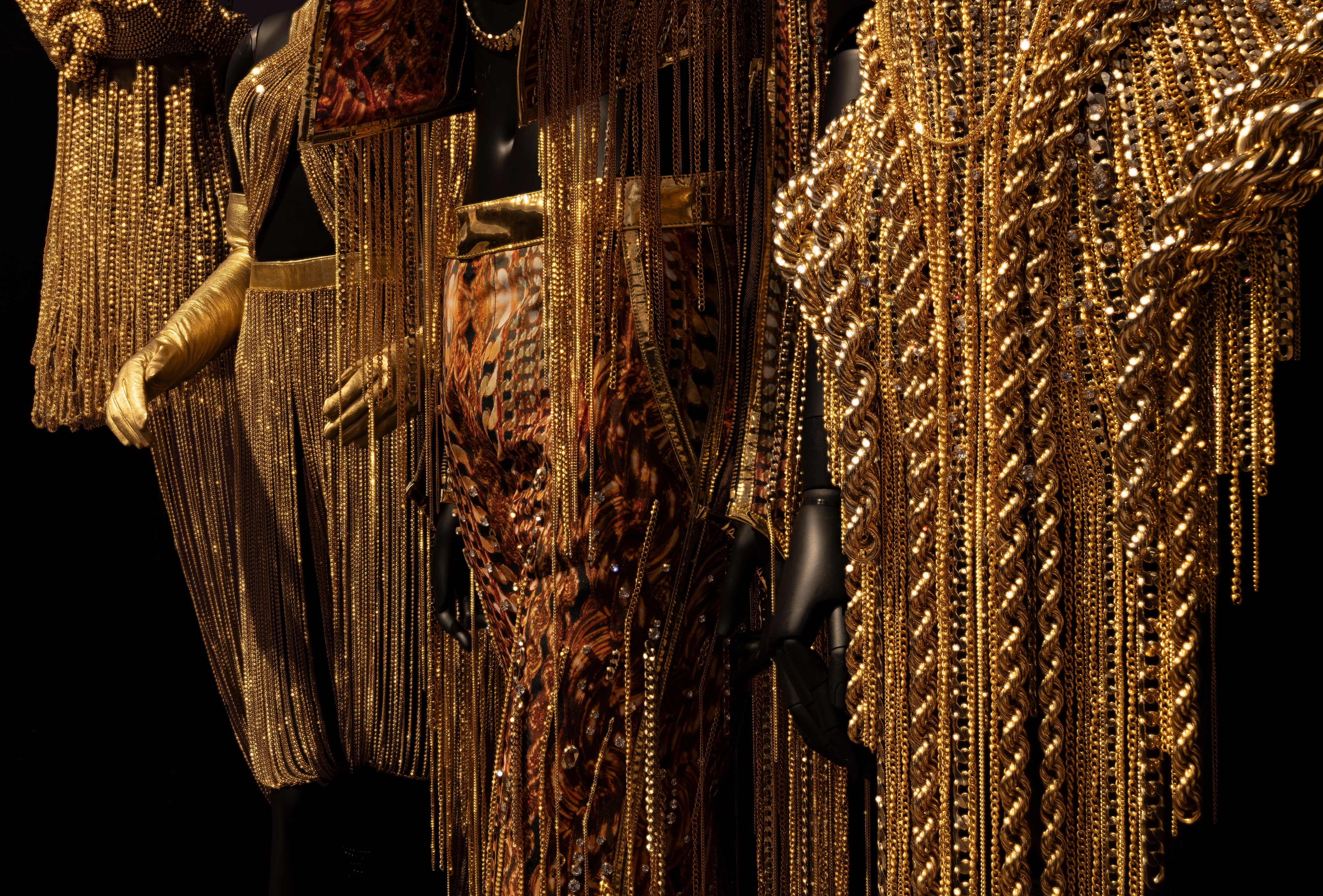 A detailed image of metallic gold fashions