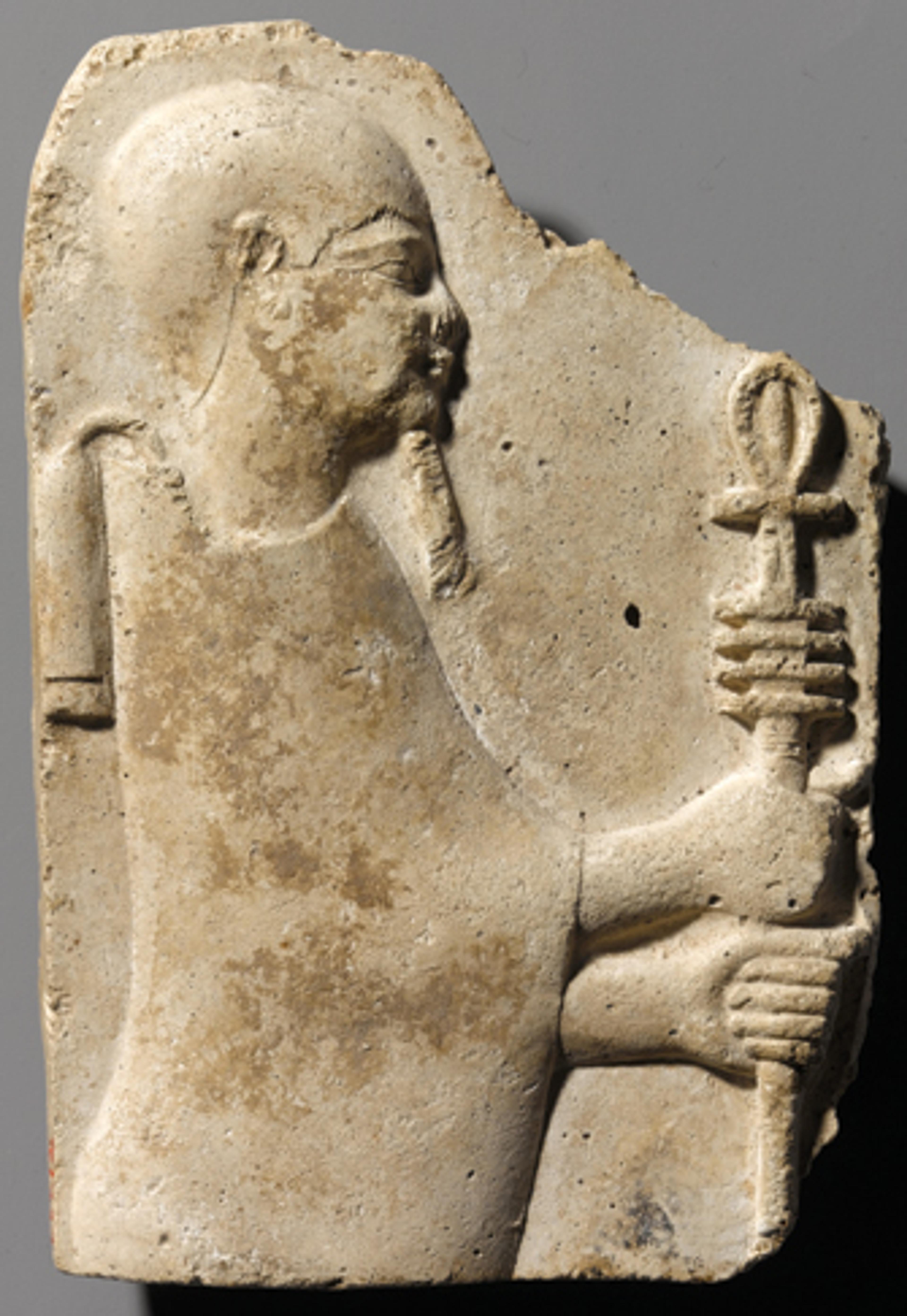 Relief of Ptah holding Ankh and Djed. Egypt, provenance not known. Late Period or Ptolemaic Period (fourth–third century B.C.E.). Stucco. Brooklyn Museum, Gift of the Ernest Erickson Foundation, 86.226.17