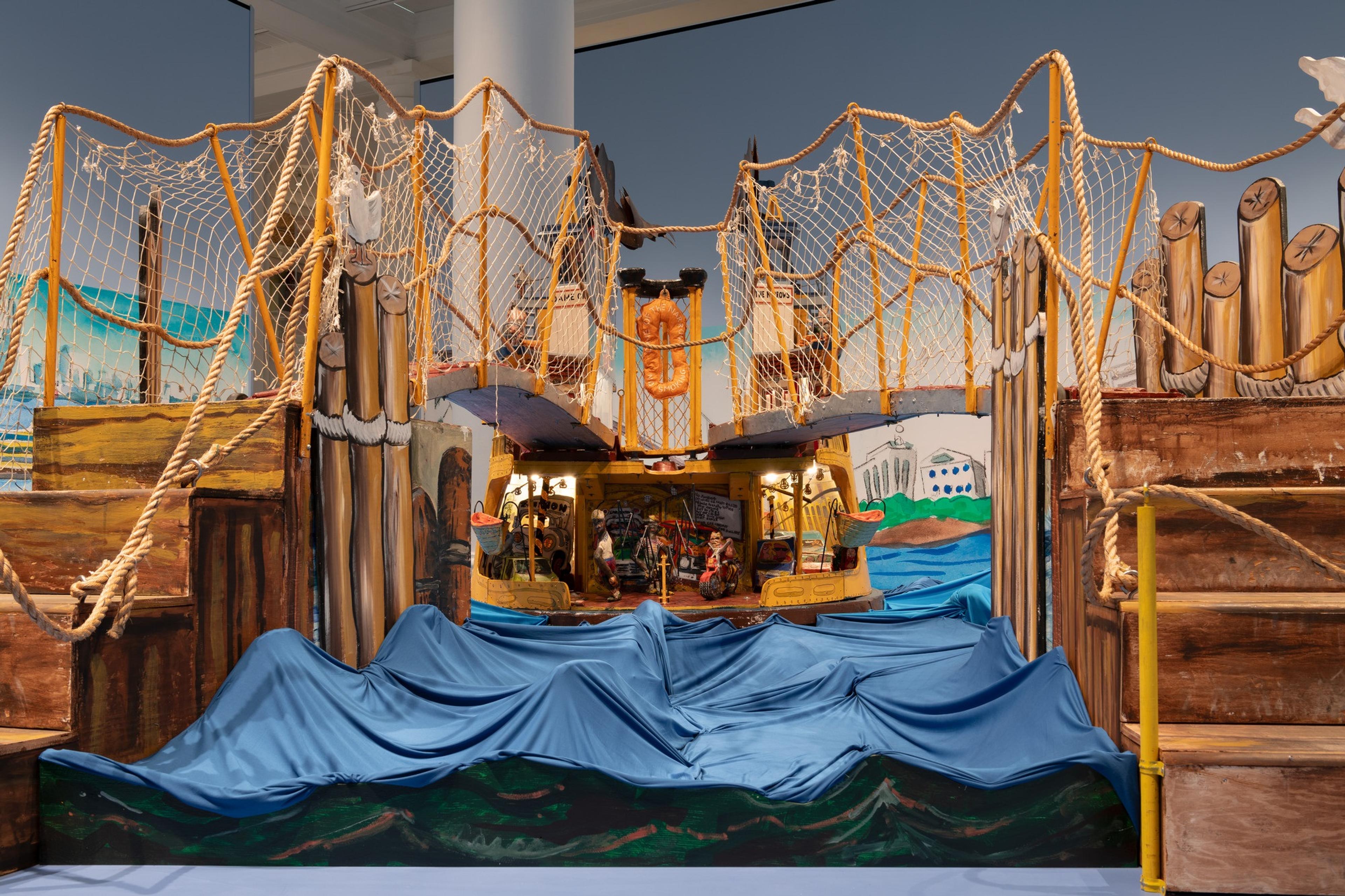 Installation view of <i>Red Grooms, Mimi Gross, and The Ruckus Construction Co.: Excerpts from “Ruckus Manhattan.”</i> Brooklyn Museum, June 13–November 2, 2025. © Red Grooms, Member of Artists Rights Society (ARS). © 2025 Mimi Gross / Artists Rights Society (ARS), New York. (Photo: Paula Abreu Pita)