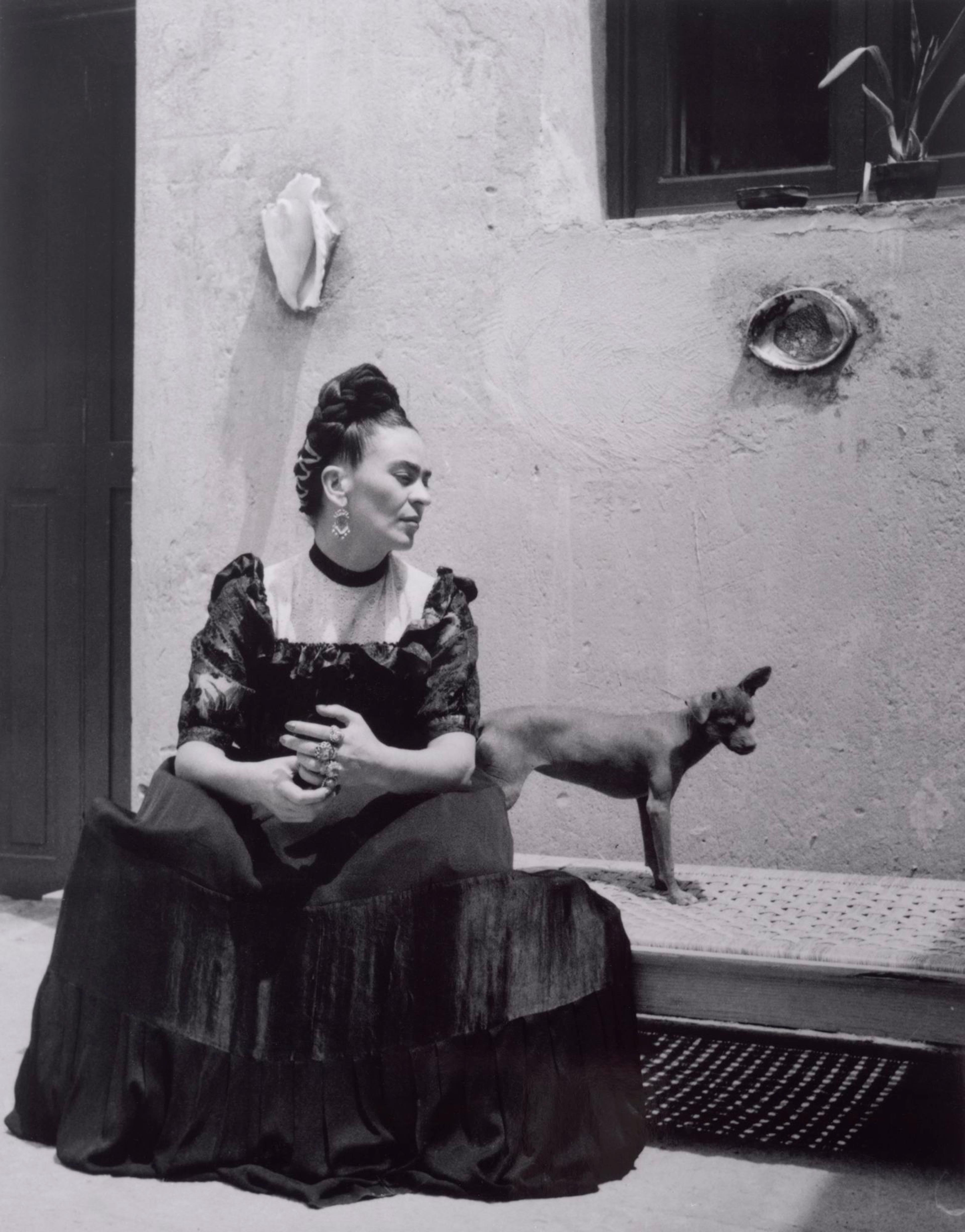 Lola Alvarez-Bravo (Mexican, 1907–1993). Frida Kahlo (with dog), circa 1944. Gelatin silver print, 10 x 8 in. (25.2 x 20.3 cm). Center for Creative Photography, University of Arizona: Lola Alvarez Bravo Archive. © 2019 Center for Creative Photography, The University of Arizona Foundation / Artists Rights Society (ARS), New York