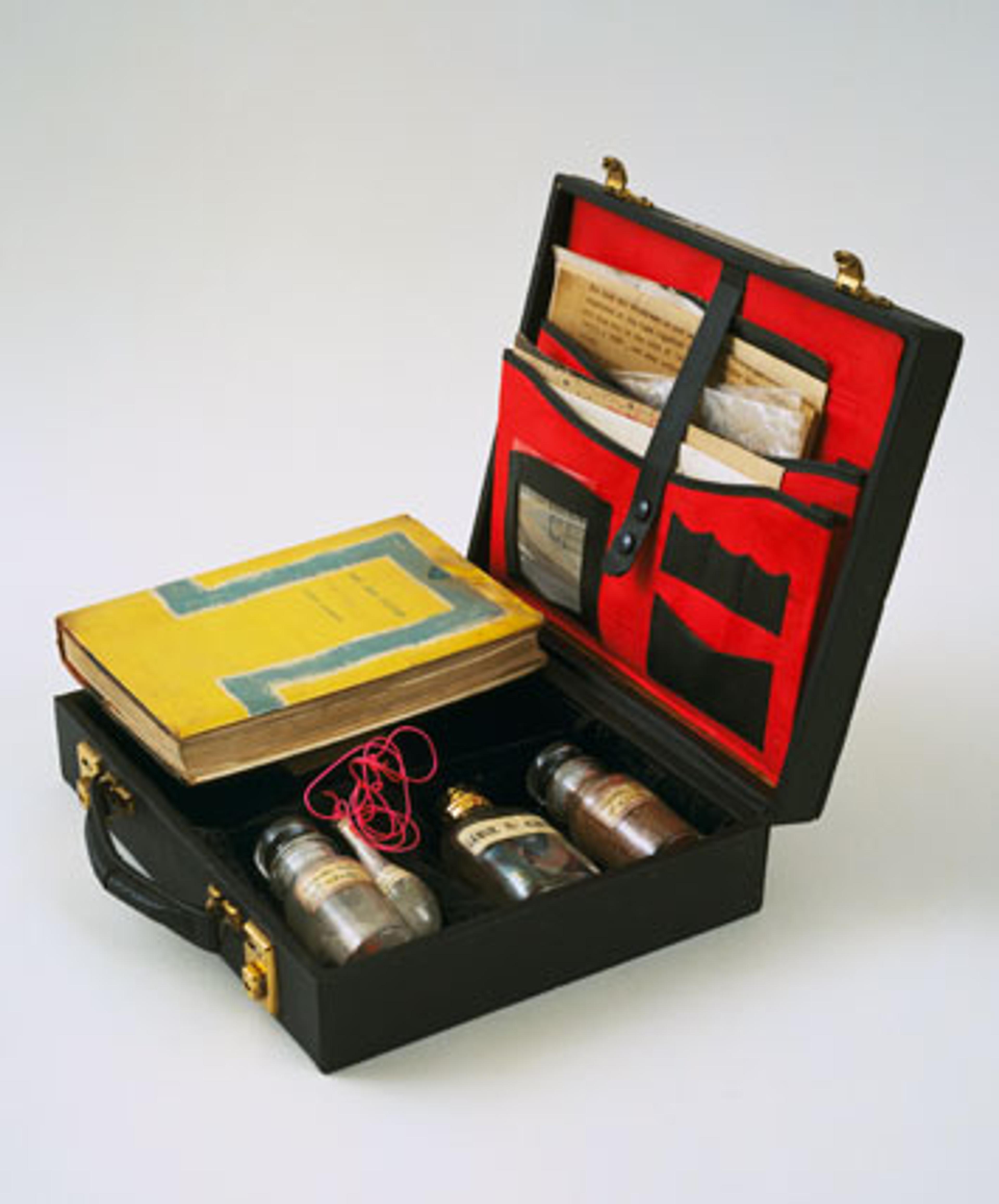 John Latham (British, b. Zambia, 1921-2006). Art and Culture, 1966–69. Leather case containing book, letters, photostats, and labeled vials filled with powders and liquids: case, 3 × 11 × 10 in. (7.9 × 28.2 × 25.3 cm). The Museum of Modern Art, New York; Blanchette Hooker Rockefeller Fund. © 2011 John Latham. (Digital image: © The Museum of Modern Art/Licensed by SCALA/Art Resource, NY)