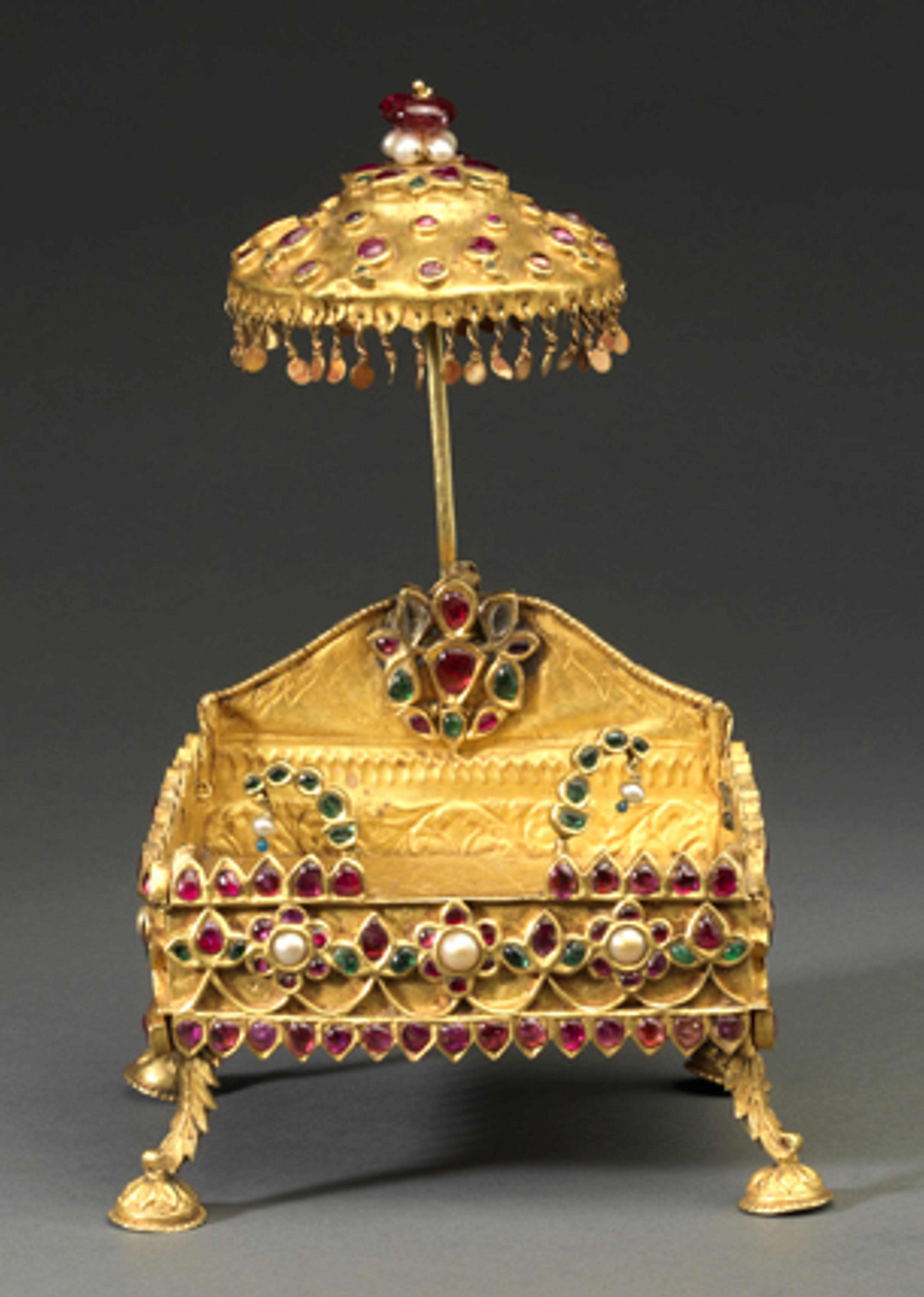 Miniature Shrine for an Icon or Ritual Object. Southern India, 19th century. Gold, rubies, emeralds, diamonds, and pearls, 51⁄8 x 35⁄8 x 31⁄8 in. (13 × 9.2 × 8 cm). Collection of Susan L. Beningson