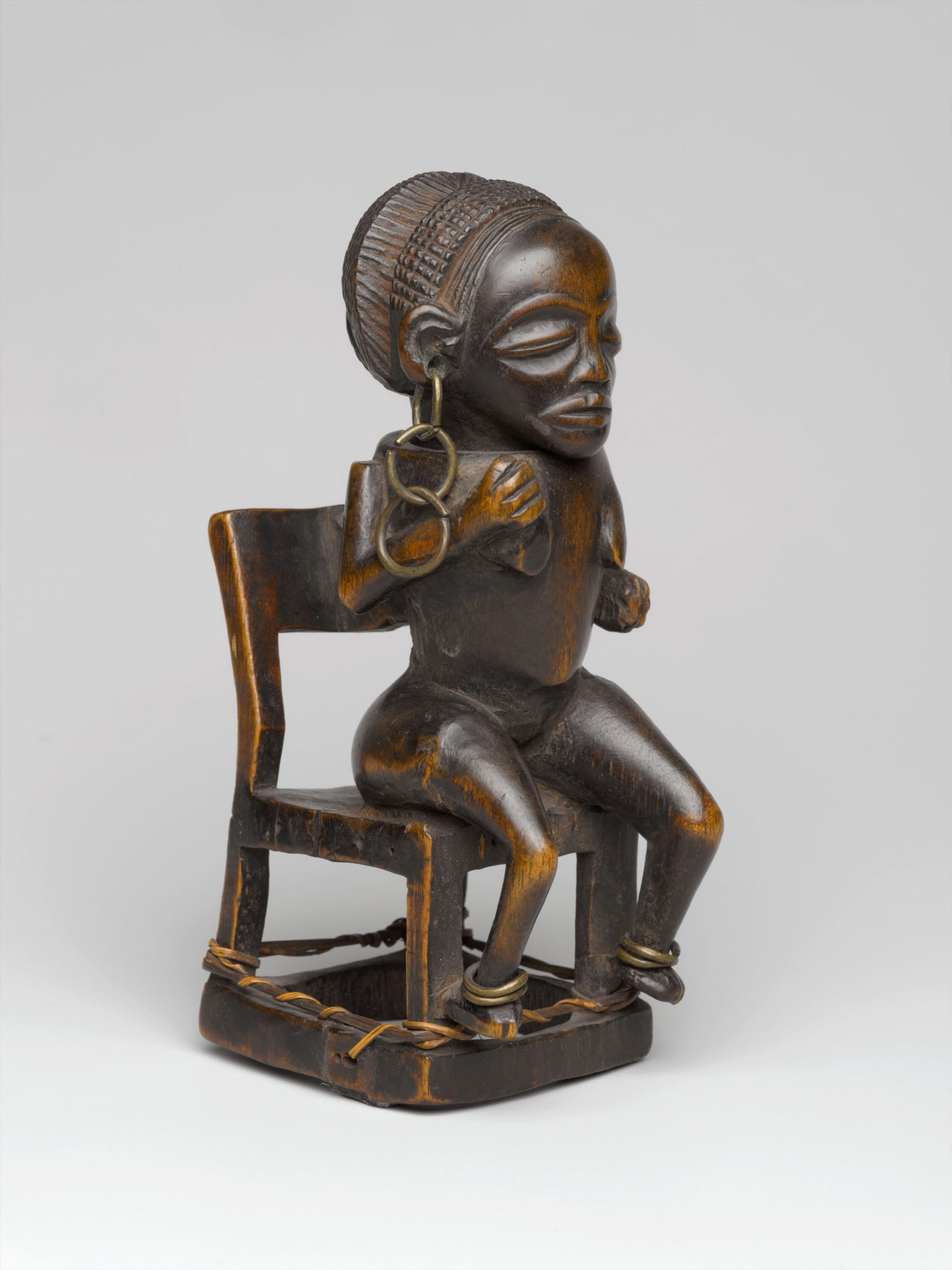 Chokwe artist. <i>Snuff Container (Tesa Ya Ma Kanya)</i>, 19th century. Wood, iron, and fiber. Brooklyn Museum, Museum Expedition 1922, Robert B. Woodward Memorial Fund, 22.1089. (Photo: Brooklyn Museum)