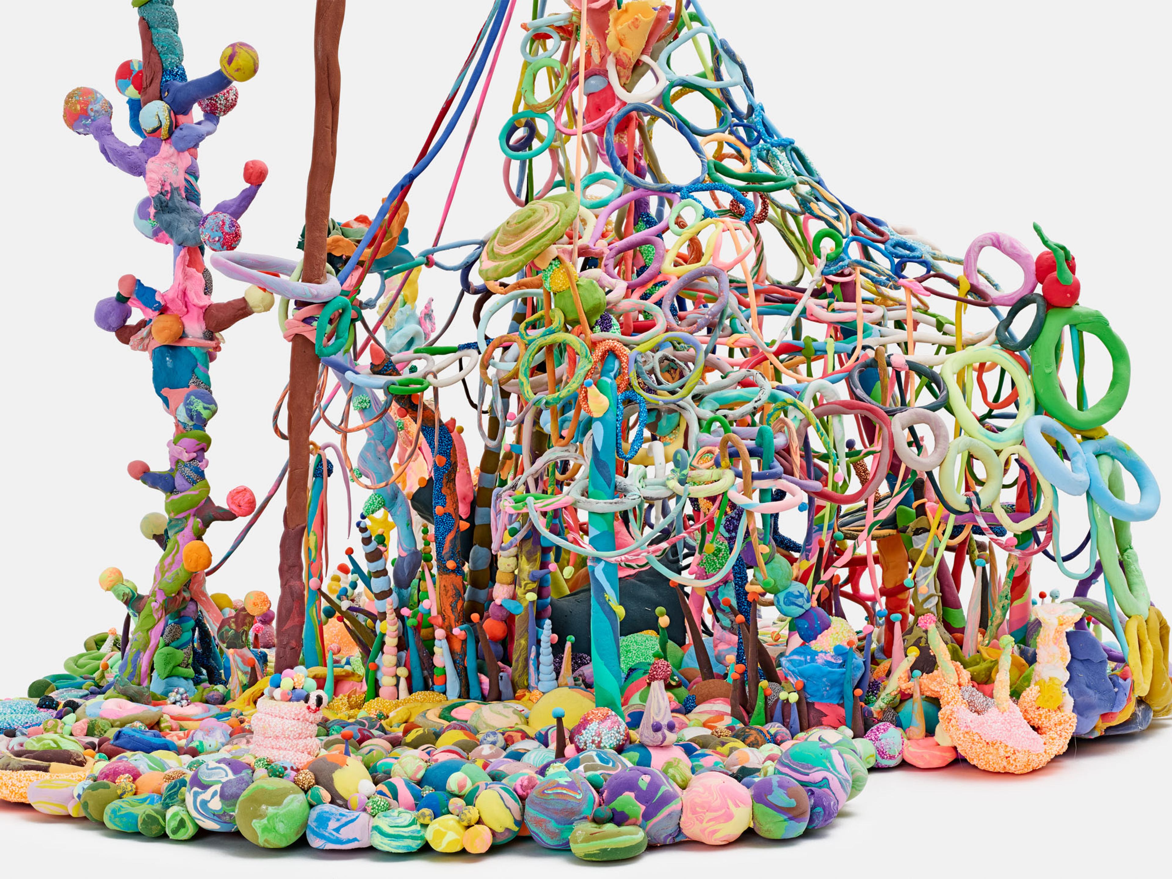 A dense, colorful sculptural landscape