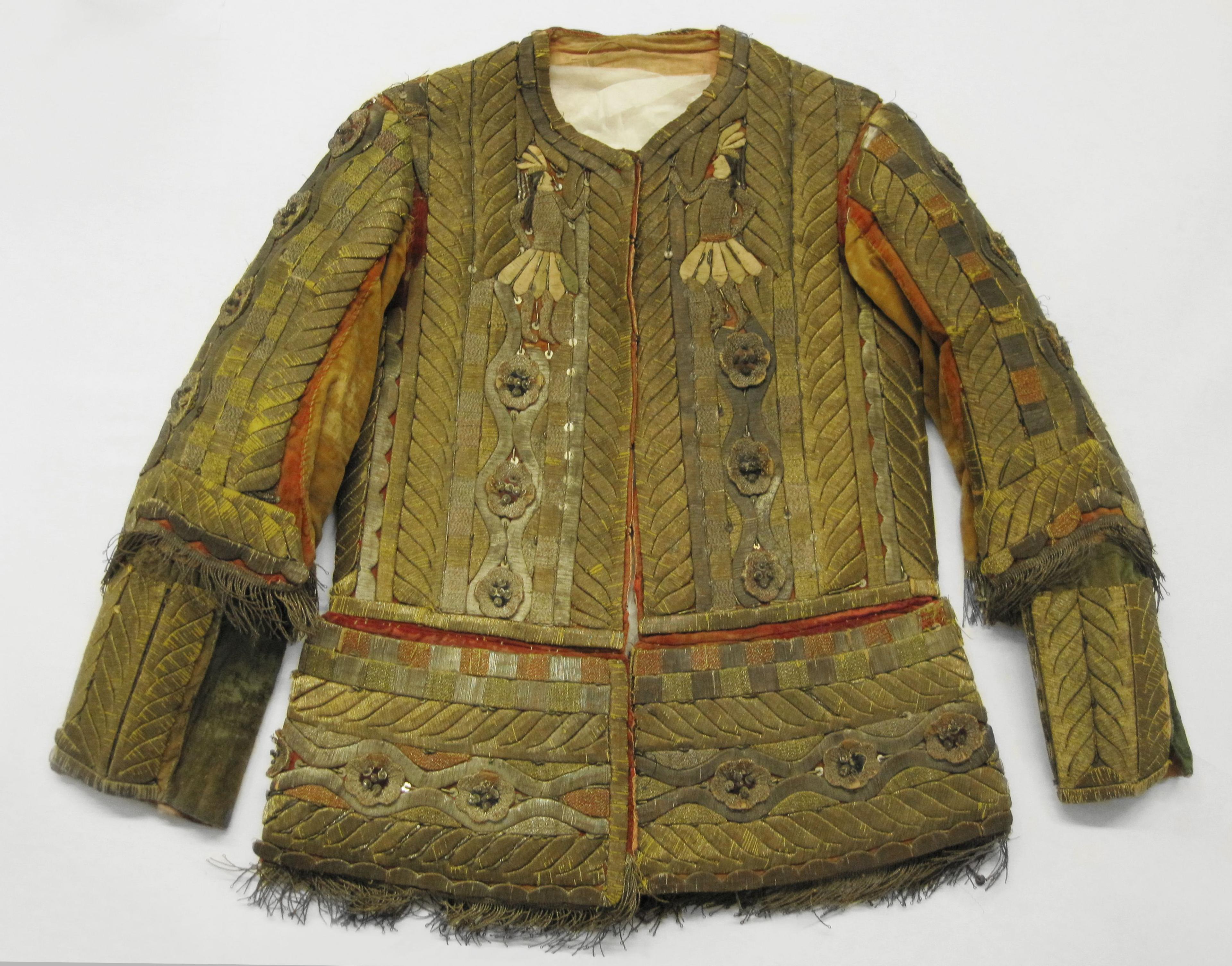 Jacket from Man's Festival Costume, 18th century. Cotton, velvet, bark strips, metallic threads, and beads, 32 x 3 x 271/2 in. (81.3 x 7.6 x 69.9 cm). Brooklyn Museum, Museum Expedition 1941, Frank L. Babbott Fund, 41.1275.274a