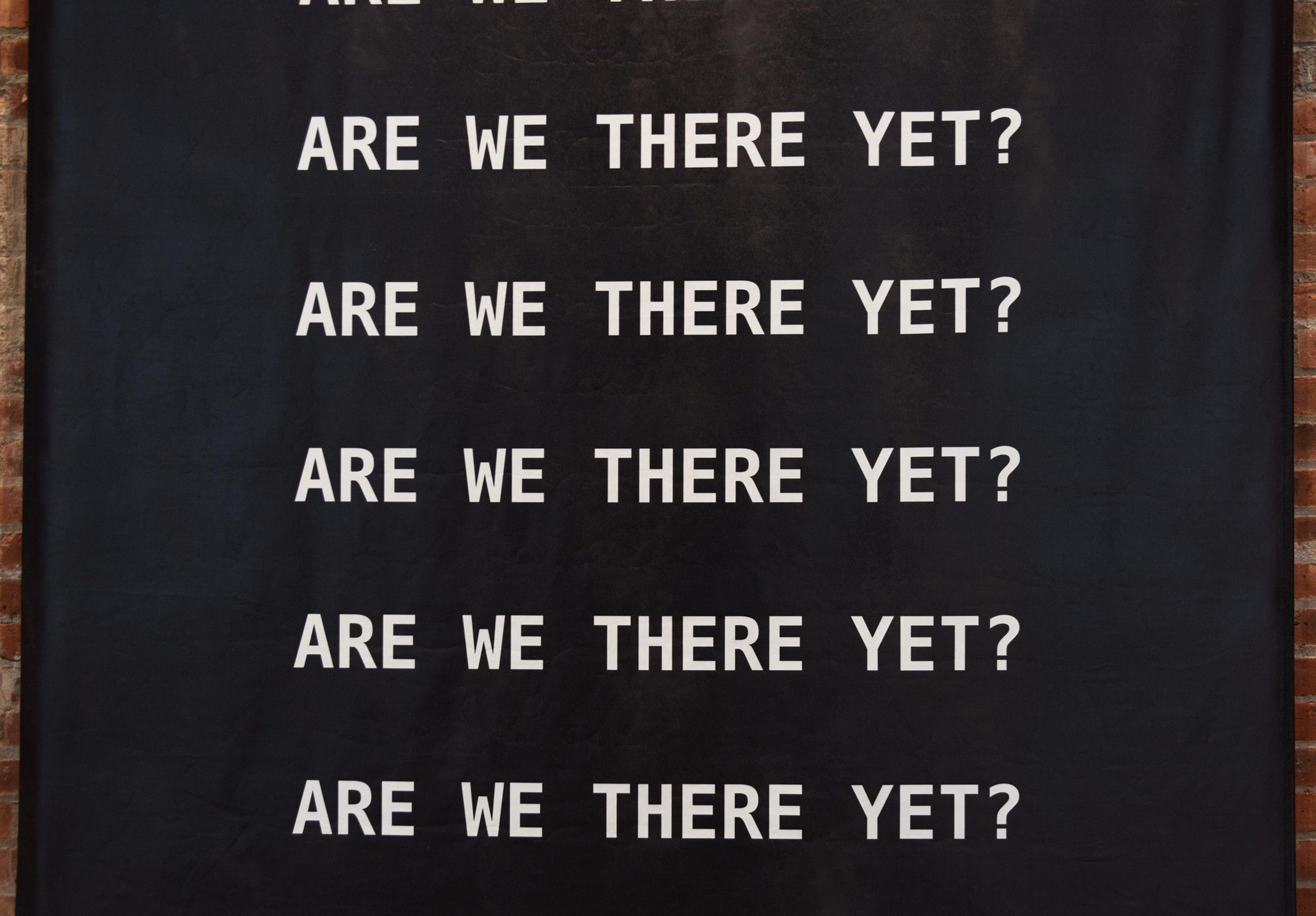 Kameelah Janan Rasheed (American, born 1985). Installation view, A QUESTION IS A SENTENCE DESIGNED TO ELICIT A RESPONSE. TODAY, WE WANT TO KNOW WHAT THE SLOPPY FUTURE HOLDS (detail), 2018. Textile (blackout fabric), four banners, each 170 × 72 (431.8 × 182.9 cm). Courtesy of the artist. © Kameelah Janan Rasheed. (Photo: Jonathan Dorado)