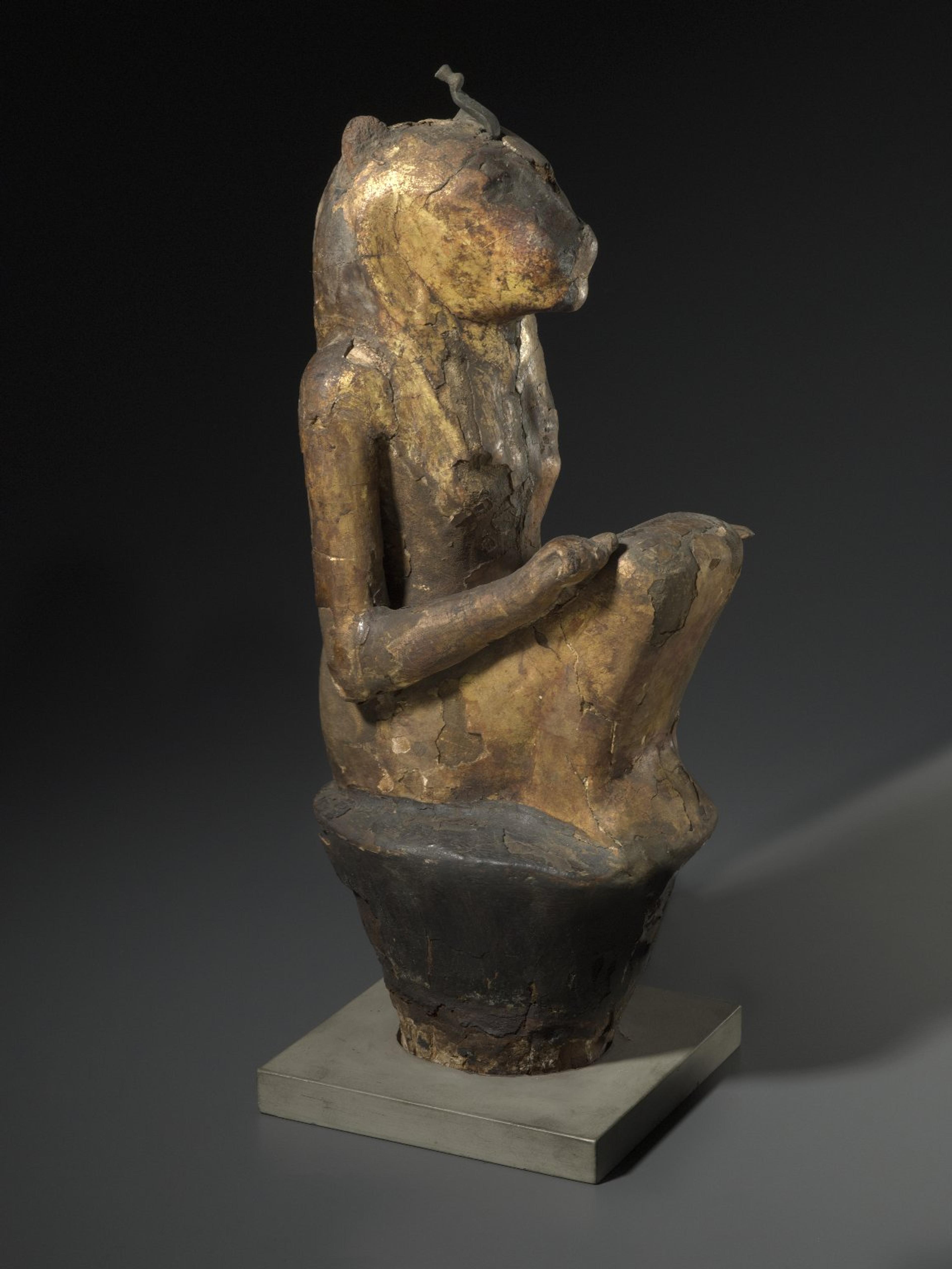 Leonine Goddess. From Egypt. Third Intermediate Period to Late Period, Dynasty 22 to Dynasty 27, C-14 dated to 770–412 B.C.E. Wood, gilding, plaster, linen, bronze,163⁄4 x 51⁄8 x 61⁄2 in. (42.5 × 13 × 16.5 cm). Brooklyn Museum, Charles Edwin Wilbour Fund, 37.1379E