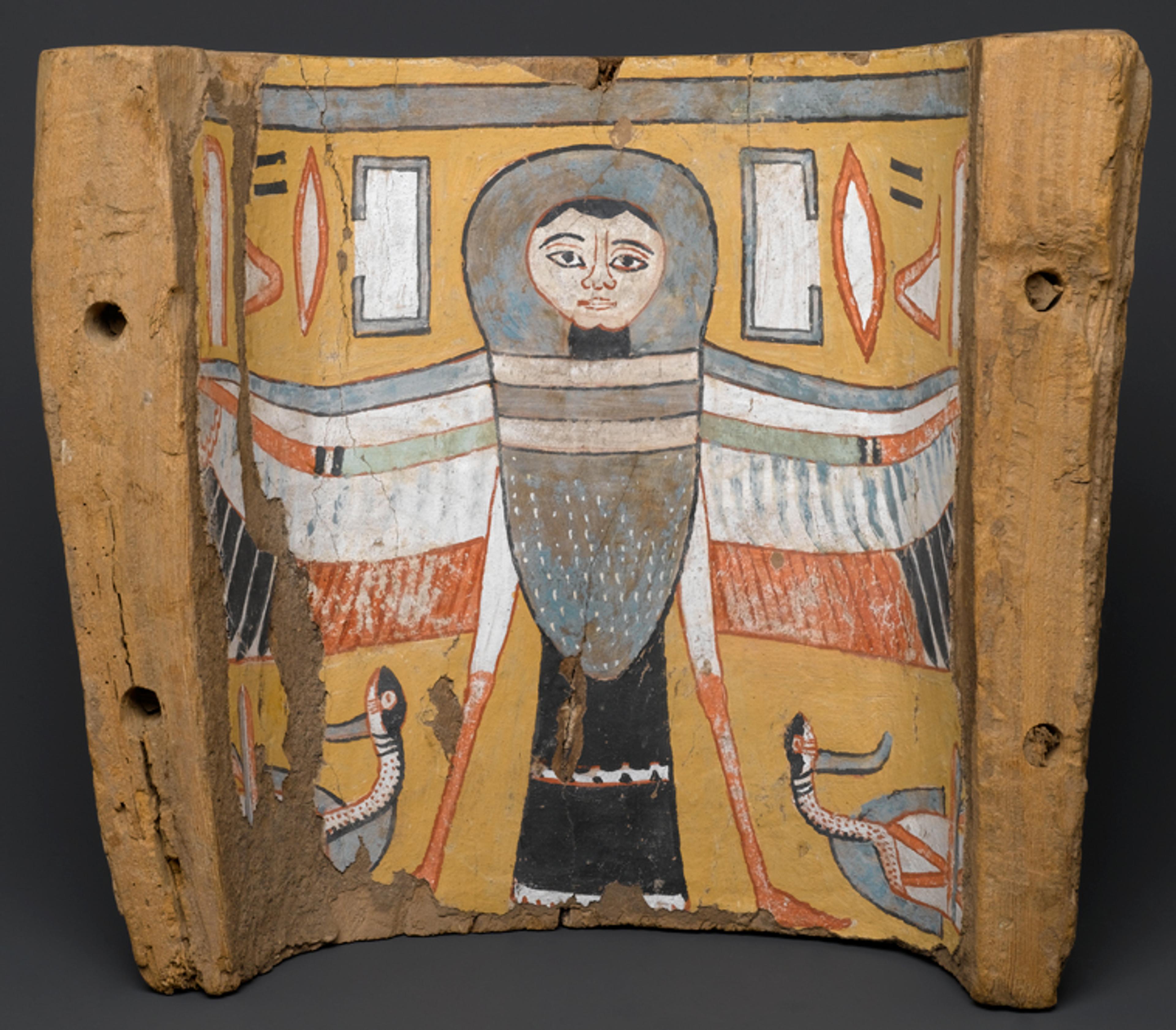 Image of a Ba-Bird on a Footpiece from a Coffin. Egypt. Third Intermediate Period, Dynasty 22, circa 945−712 B.C.E. Wood and plaster, painted, 11 × 125⁄8 x 55⁄8 in. (28 × 32.1 × 14.3 cm). Brooklyn Museum, Charles Edwin Wilbour Fund, 75.27