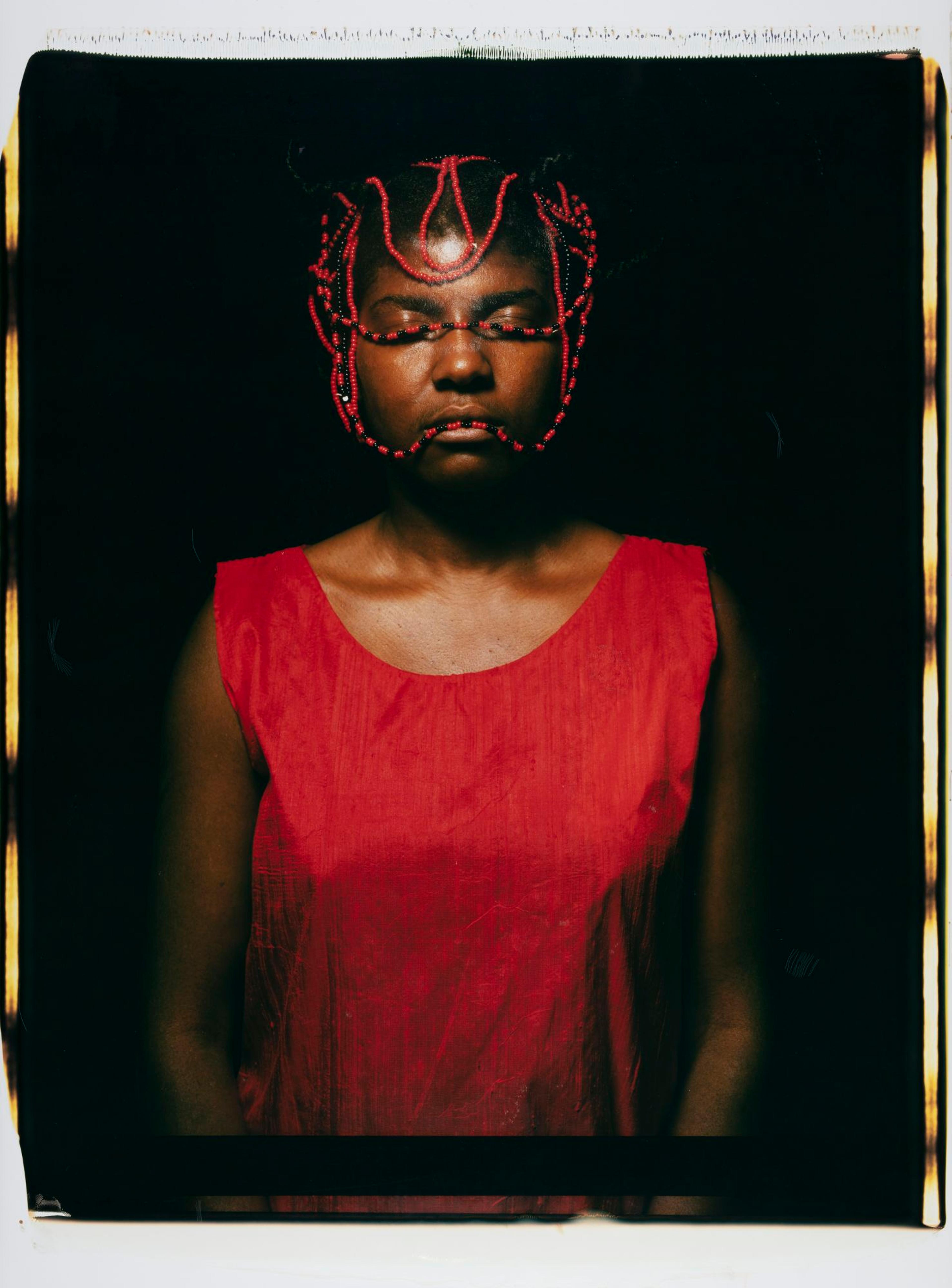 María Magdalena Campos-Pons (born Matanzas, Cuba, 1959). Red Composition (detail), from the series Los Caminos (The Path), 1997. Triptych of Polaroid Polacolor Pro photographs, framed: approx. 37 × 29 in. (94 × 73.7 cm) each; approx. 37 × 87 in. (94 × 221 cm) overall. Collection of Wendi Norris. © María Magdalena Campos-Pons. (Photo: courtesy of the artist)
