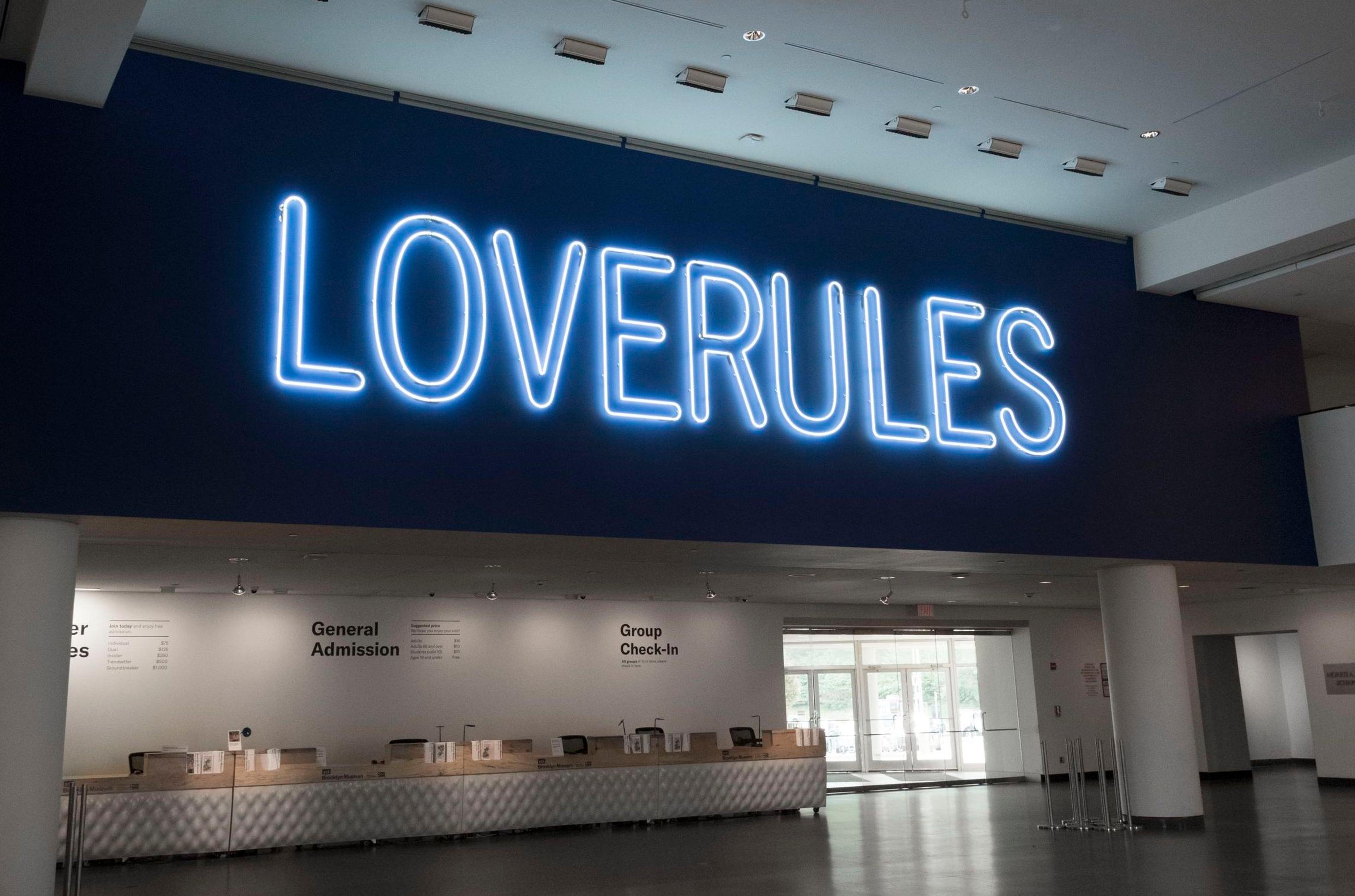 Hank Willis Thomas (American, born 1976). LOVE RULES, 2018. Neon, 69 x 367.4 in. (175.3 x 933.3 cm). Courtesy of the artist. © Hank Willis Thomas. (Photo: Jonathan Dorado)