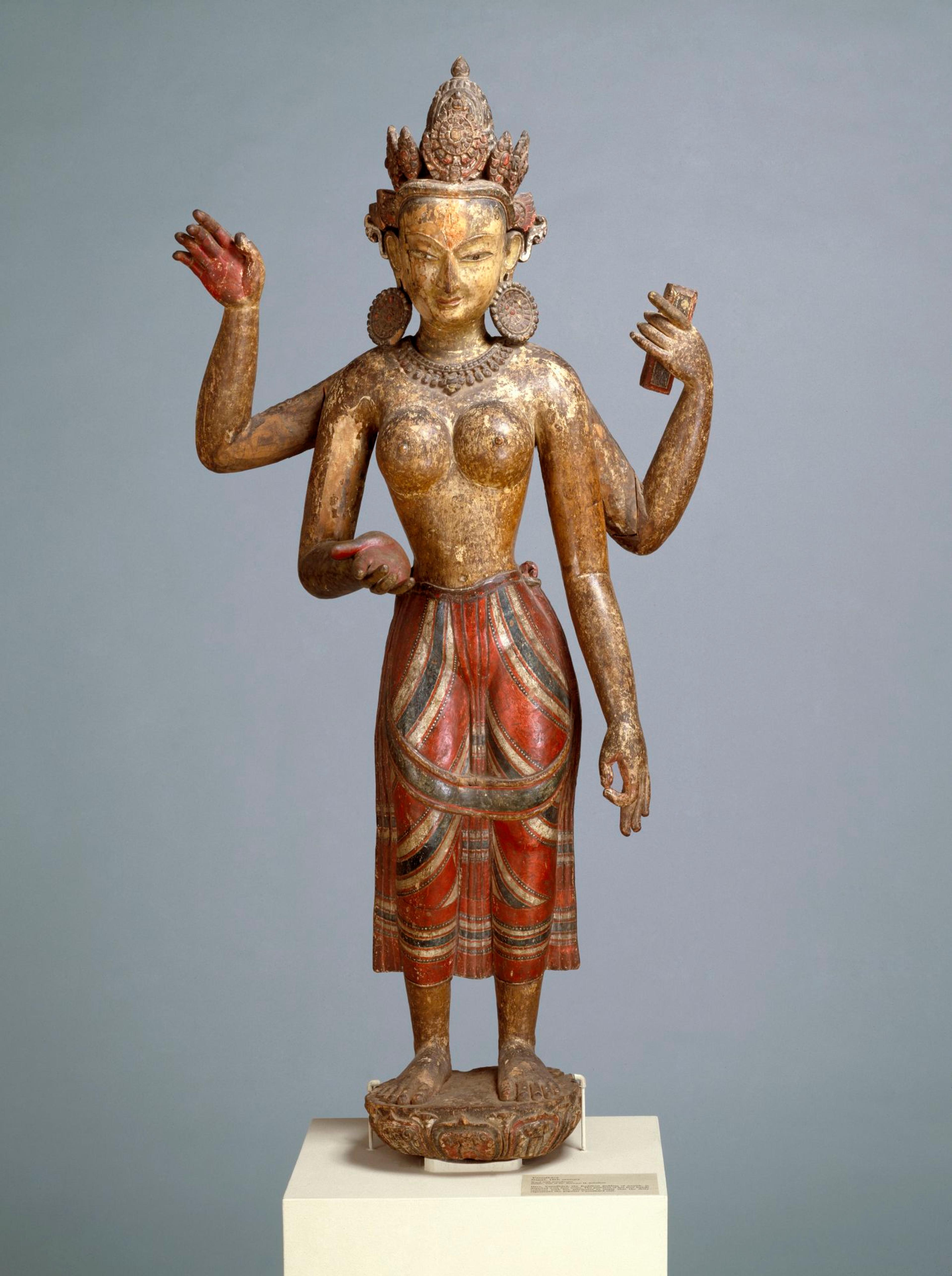 Vasudhara. Nepal, 16th century. Wood, pigment, 53 3/4 × 24 × 15 1/2 in. (136.5 × 61 × 39.4 cm). Brooklyn Museum; Gift of Dr. Bertram H. Schaffner, 86.137. (Photo: Brooklyn Museum)