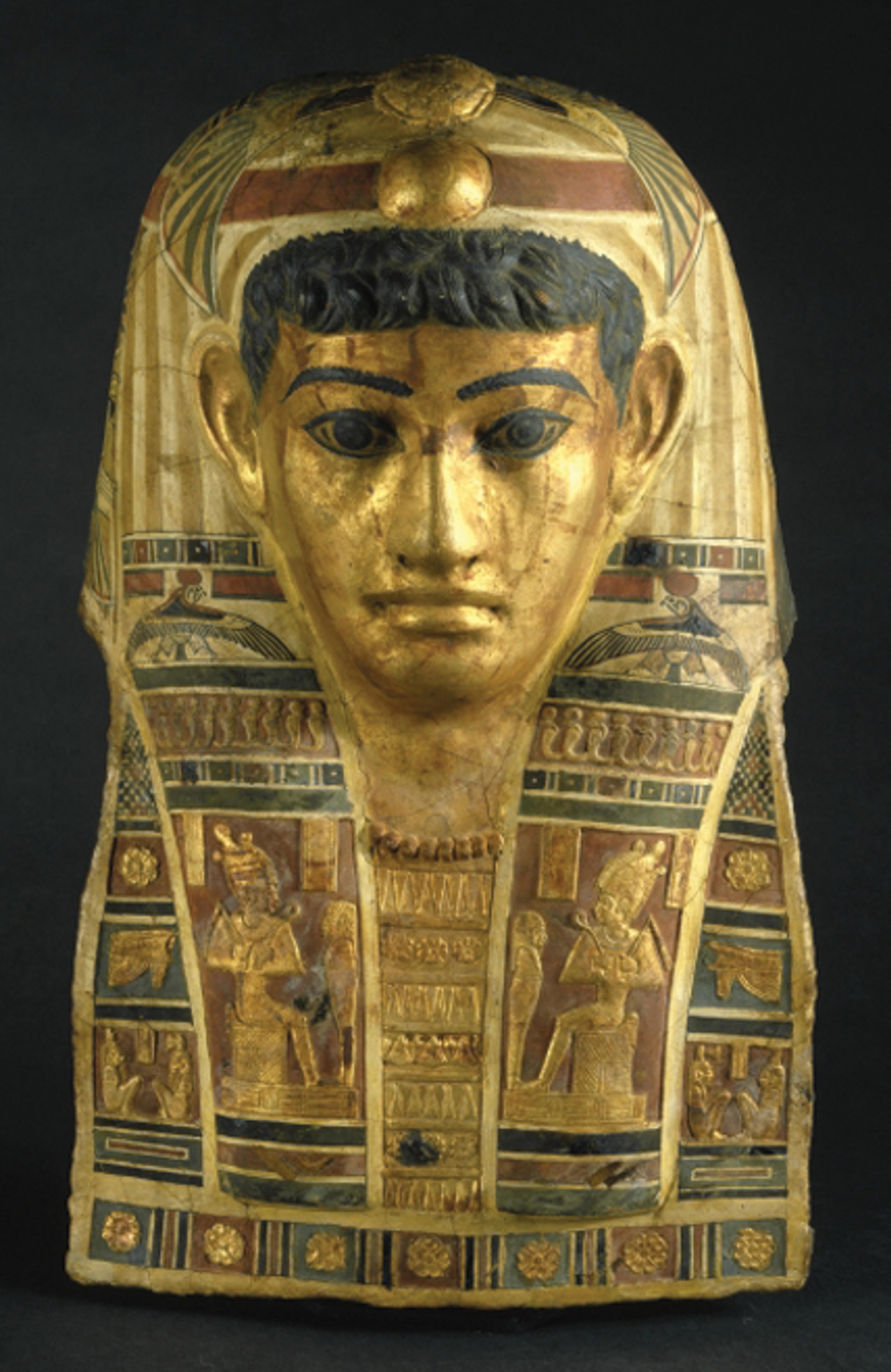 Mummy Mask of a Man. Egypt, provenance not known. Roman Period, early 1st century C.E. Stucco, gilded and painted, 201⁄4 x 13 × 77⁄8 in. (51.5 × 33 × 20 cm). Brooklyn Museum, Charles Edwin Wilbour Fund, 72.57