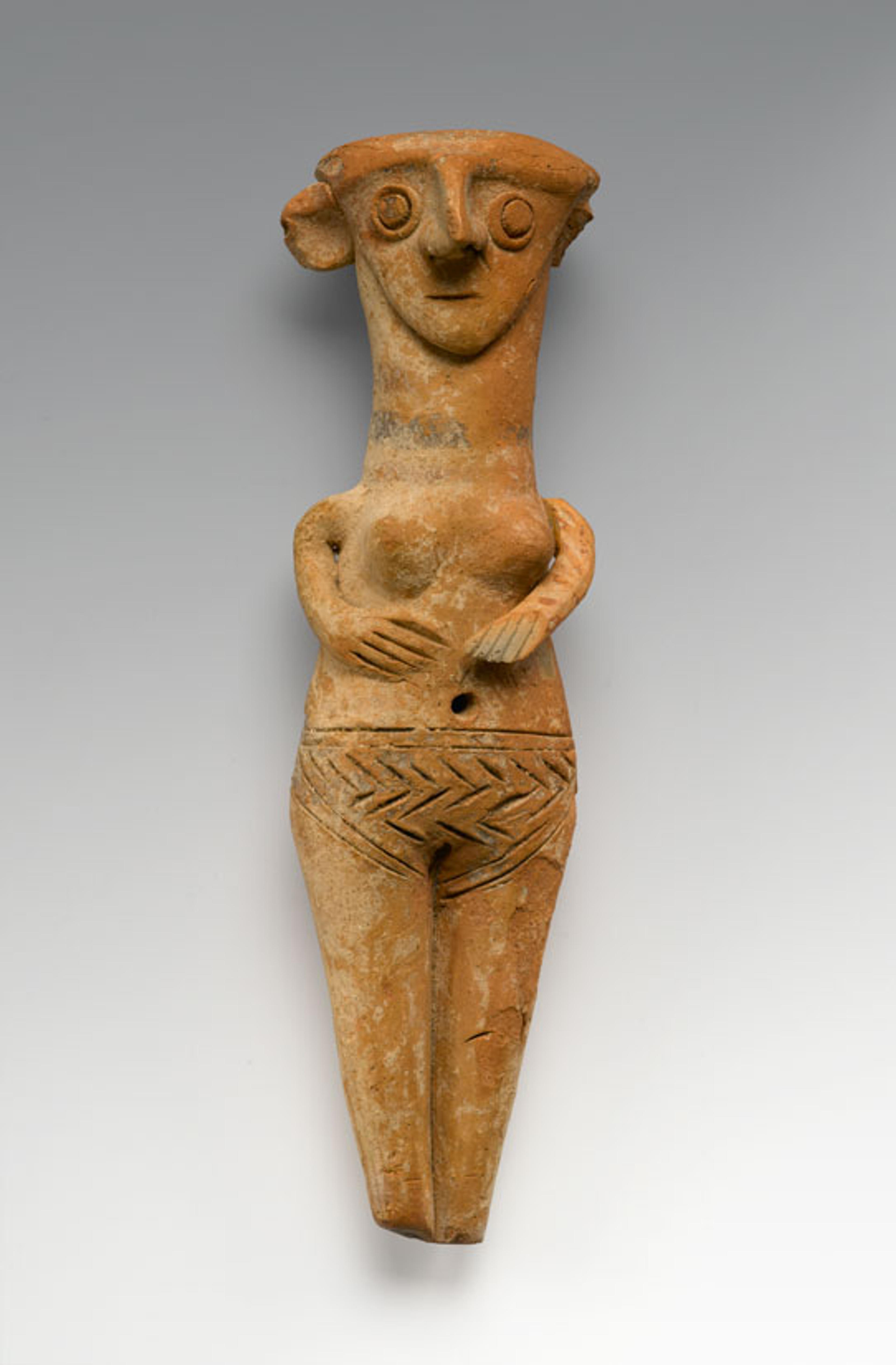 Female Figurine. Provenance not known; type known from Cyprus. Late Bronze Age, Late Cypriot II, circa 1450–1200 B.C.E. Terracotta, pigment, 3 × 2 × 2 in. (9.1 × 5.5 × 5.3 cm). Brooklyn Museum, Gift of Mrs. Fred Betts, 22.12