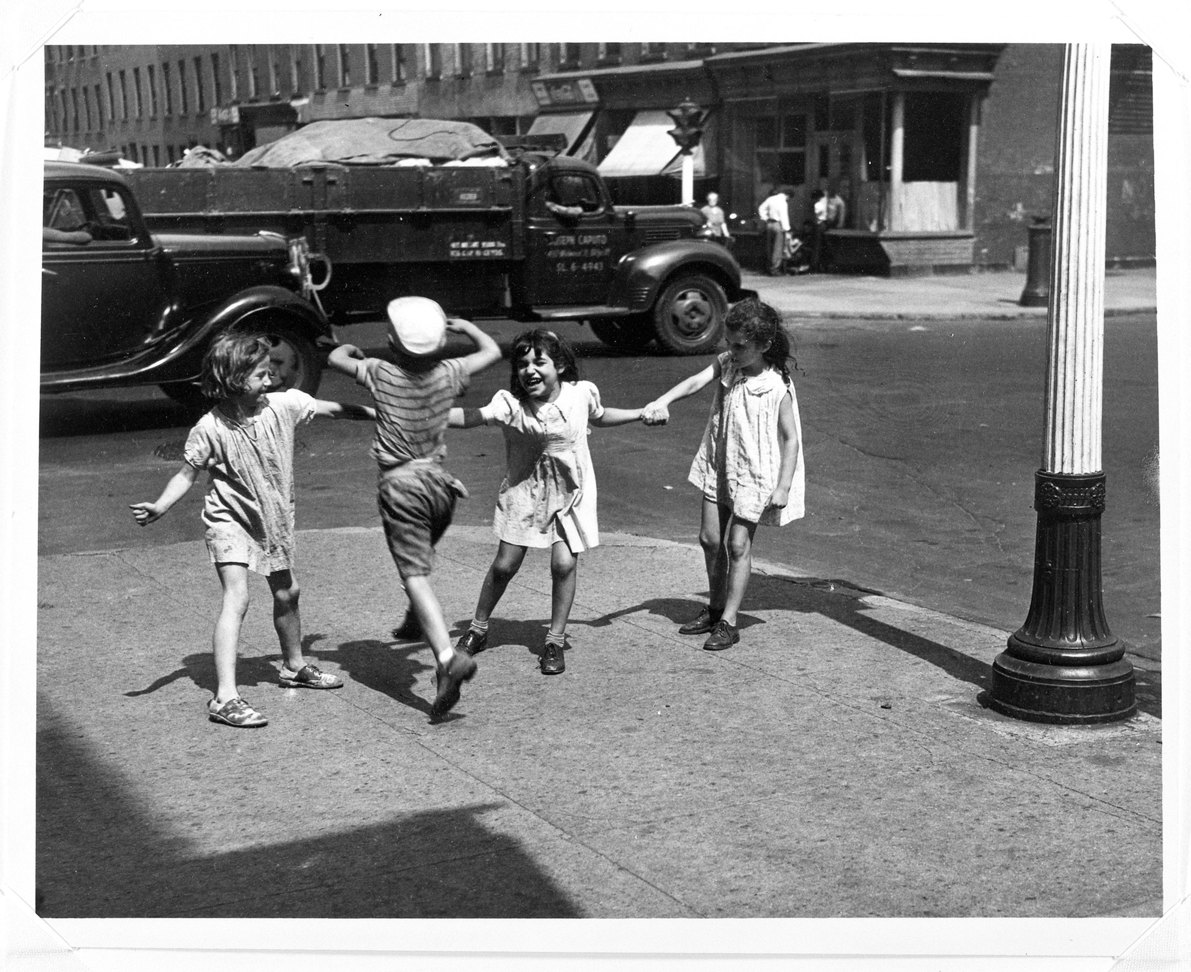 Print showing children playing and holding hands