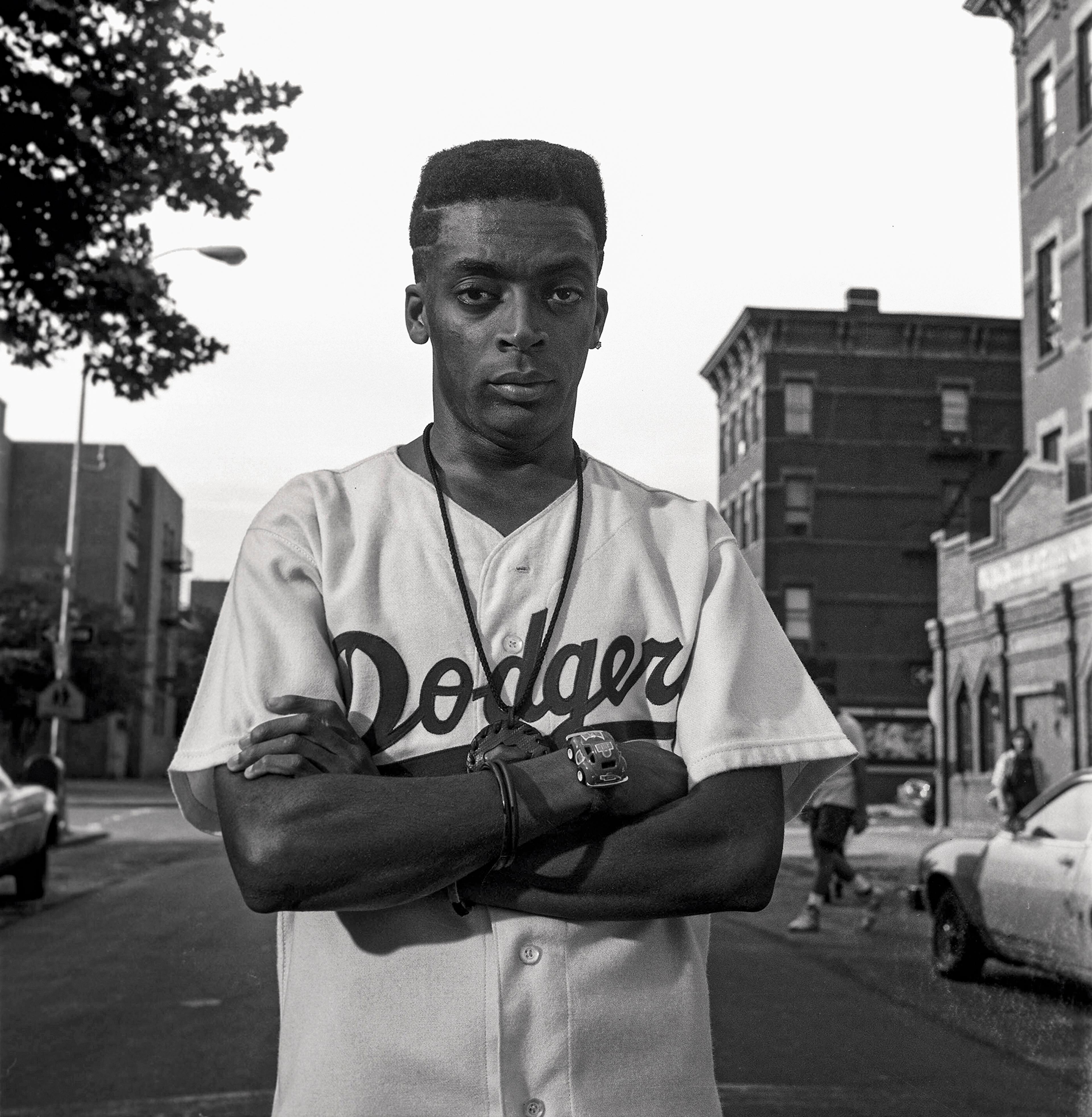 Black-and-white photo of a man in a Dodgers jersey