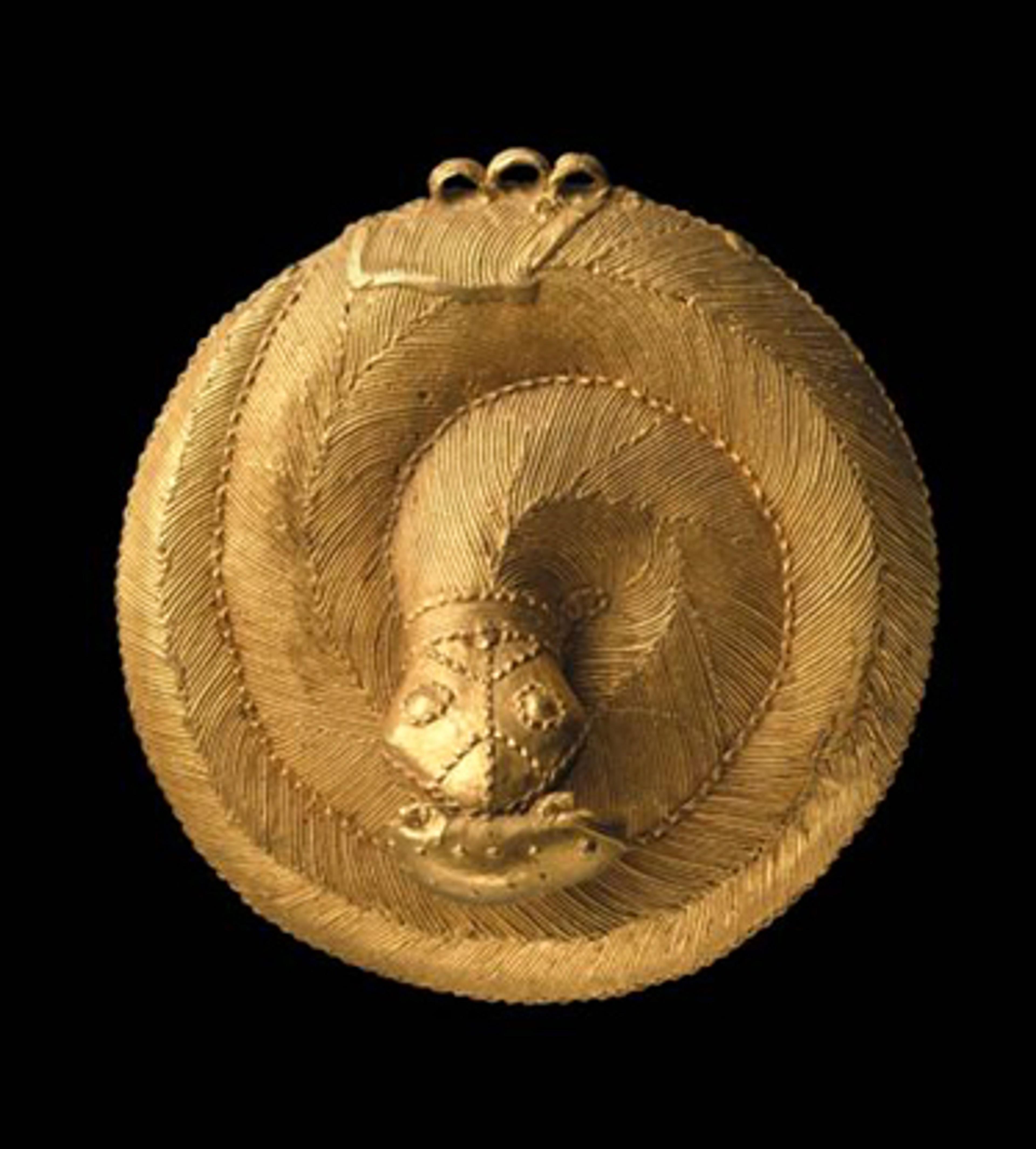 Ebrié artist. <i>Snake Pendant</i>, 19th century. Gold. Brooklyn Museum; Frank L. Babbott Fund, 54.16. (Photo: Brooklyn Museum)