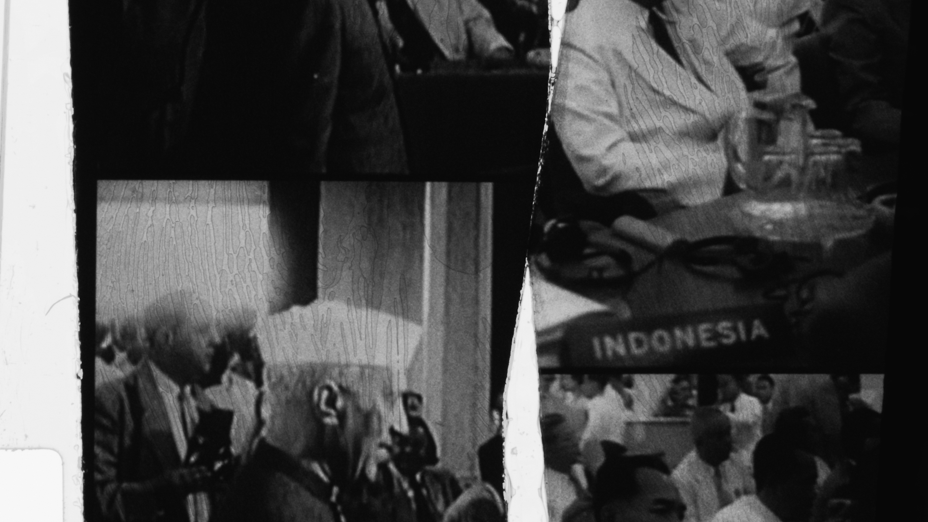 Cut-up pieces of footage from the 1955 Bandung Conference, taped and spliced back together. Suneil Sanzgiri (born Dallas, Texas, 1989; active in Brooklyn, New York). Still from <i>Two Refusals (Would We Recognize Ourselves Unbroken?)</i>, 2023. Two-channel video projection, 16 mm to digital (color, sound): 34 min. Courtesy of the artist