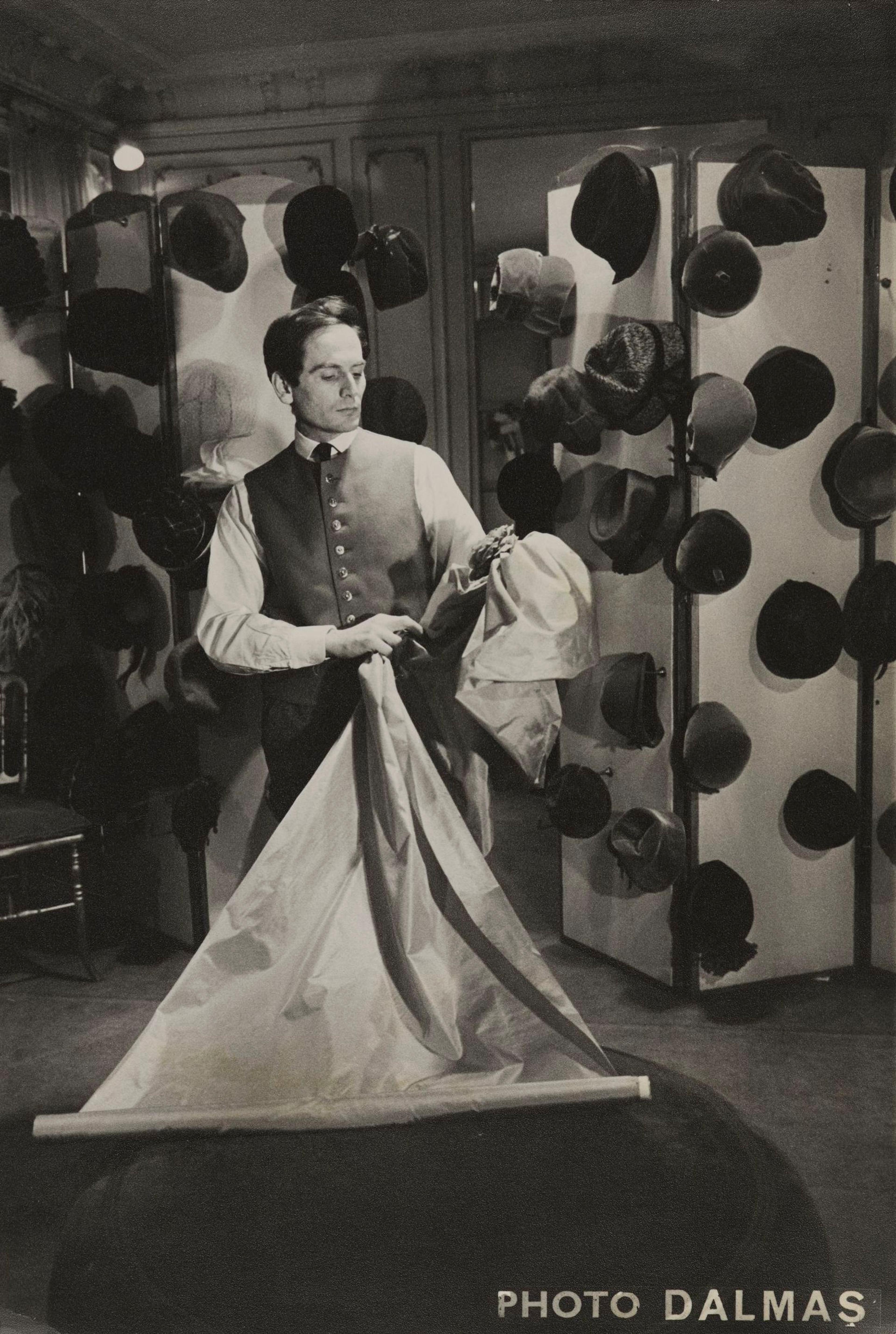 Pierre Cardin in his couture salon, 1952. (Photo: Courtesy of Archives Pierre Cardin. © Archives Pierre Cardin)