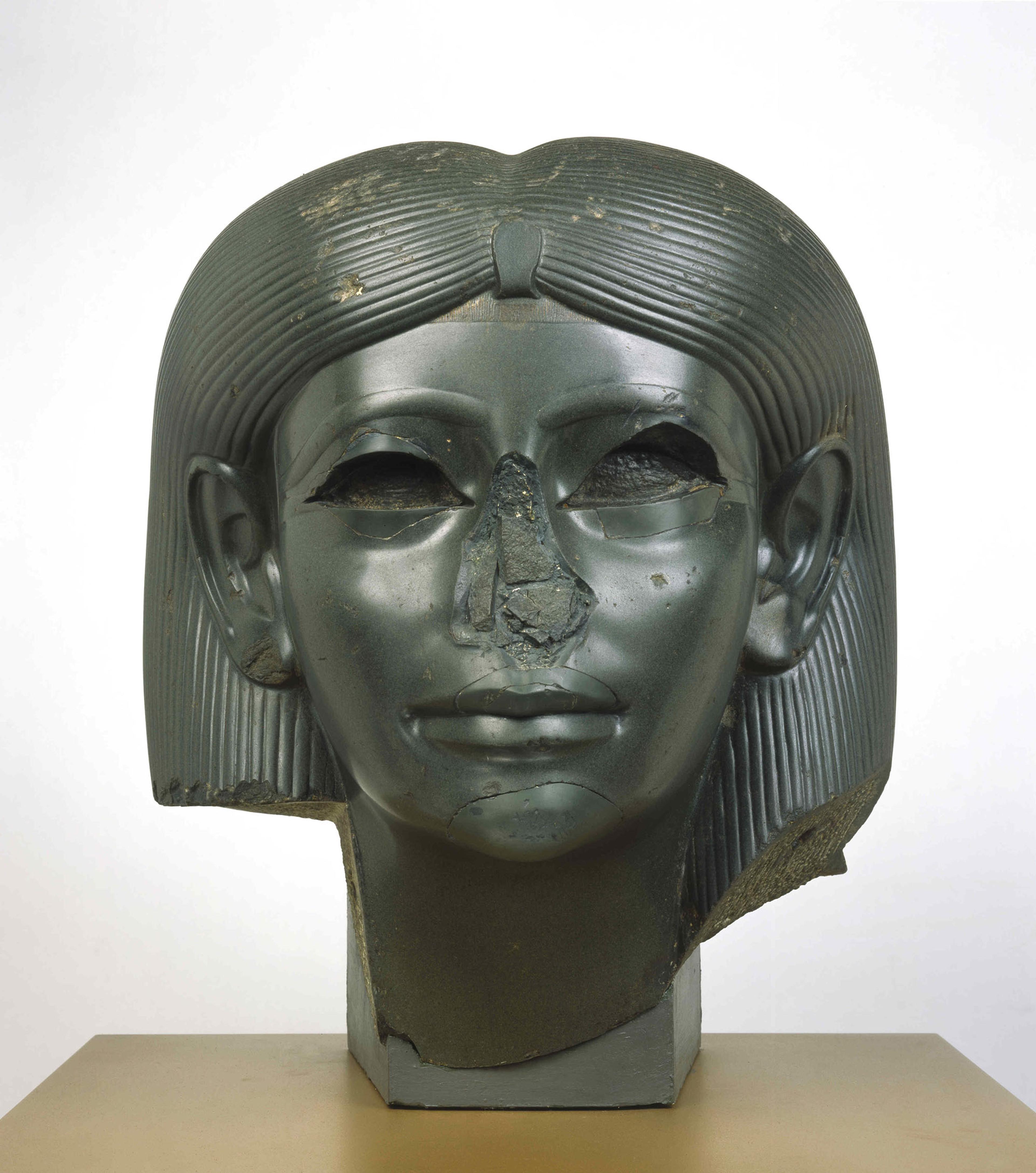 Head from a Female Sphinx. Found in Italy, said to have been in the ruins of Emperor Hadrian’s villa at Tivoli, outside Rome; originally from Egypt, probably Heliopolis. Middle Kingdom, Dynasty 12, reign of Amunemhat II, circa 1876–1842 B.C.E. Chlorite, 155⁄16 x 131⁄8 x 1315⁄16 in. (38.9 × 33.3 × 35.4 cm). Brooklyn Museum, Charles Edwin Wilbour Fund, 56.85