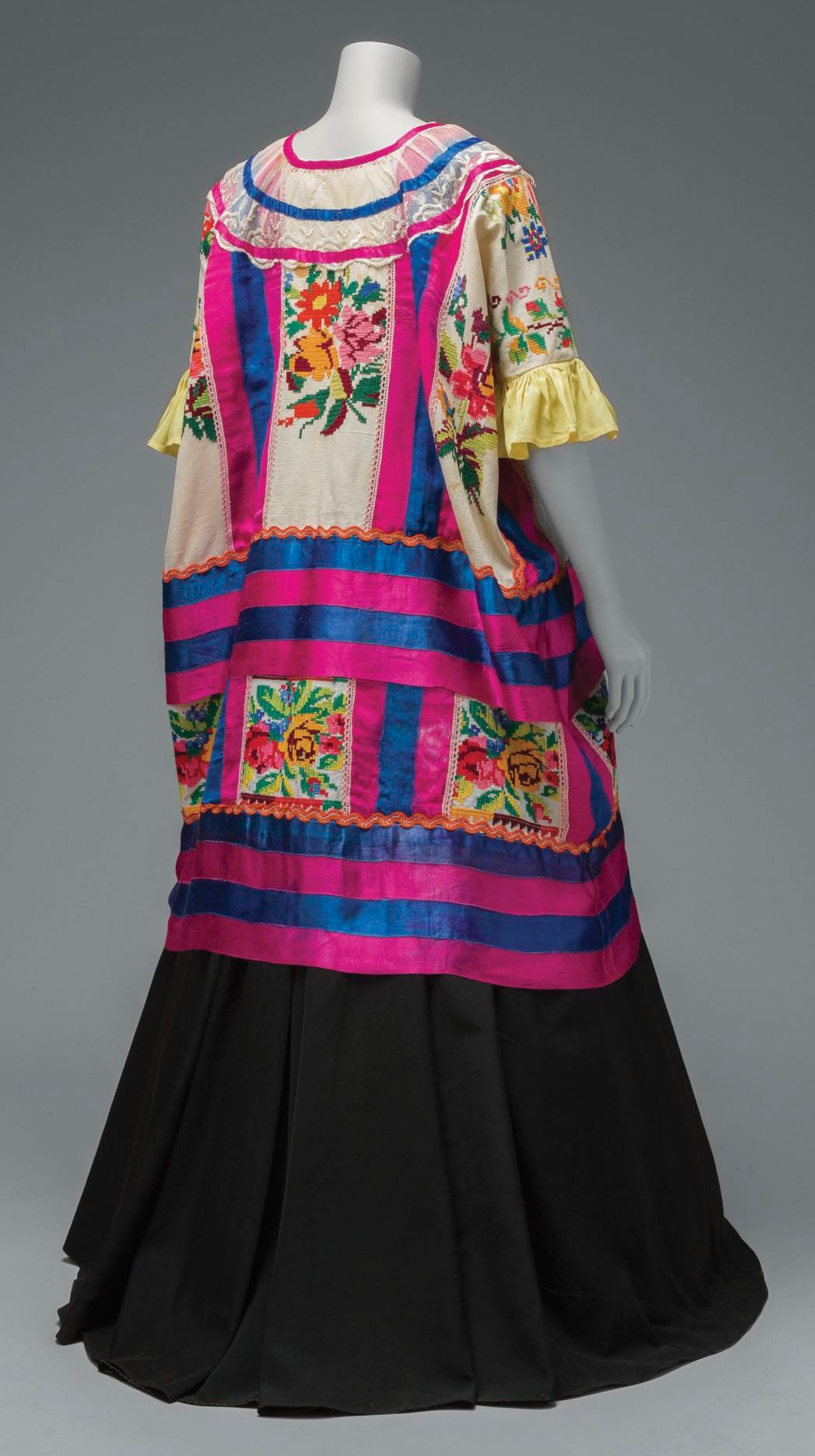 Cotton Mazatec huipil hand-embroidered and appliquéd; plain floor-length skirt. © Diego Rivera and Frida Kahlo Archives, Banco de México, Fiduciary of the Trust of the Diego Rivera and Frida Kahlo Museums. (Photo: Javier Hinojosa, courtesy of V&amp;A Publishing)