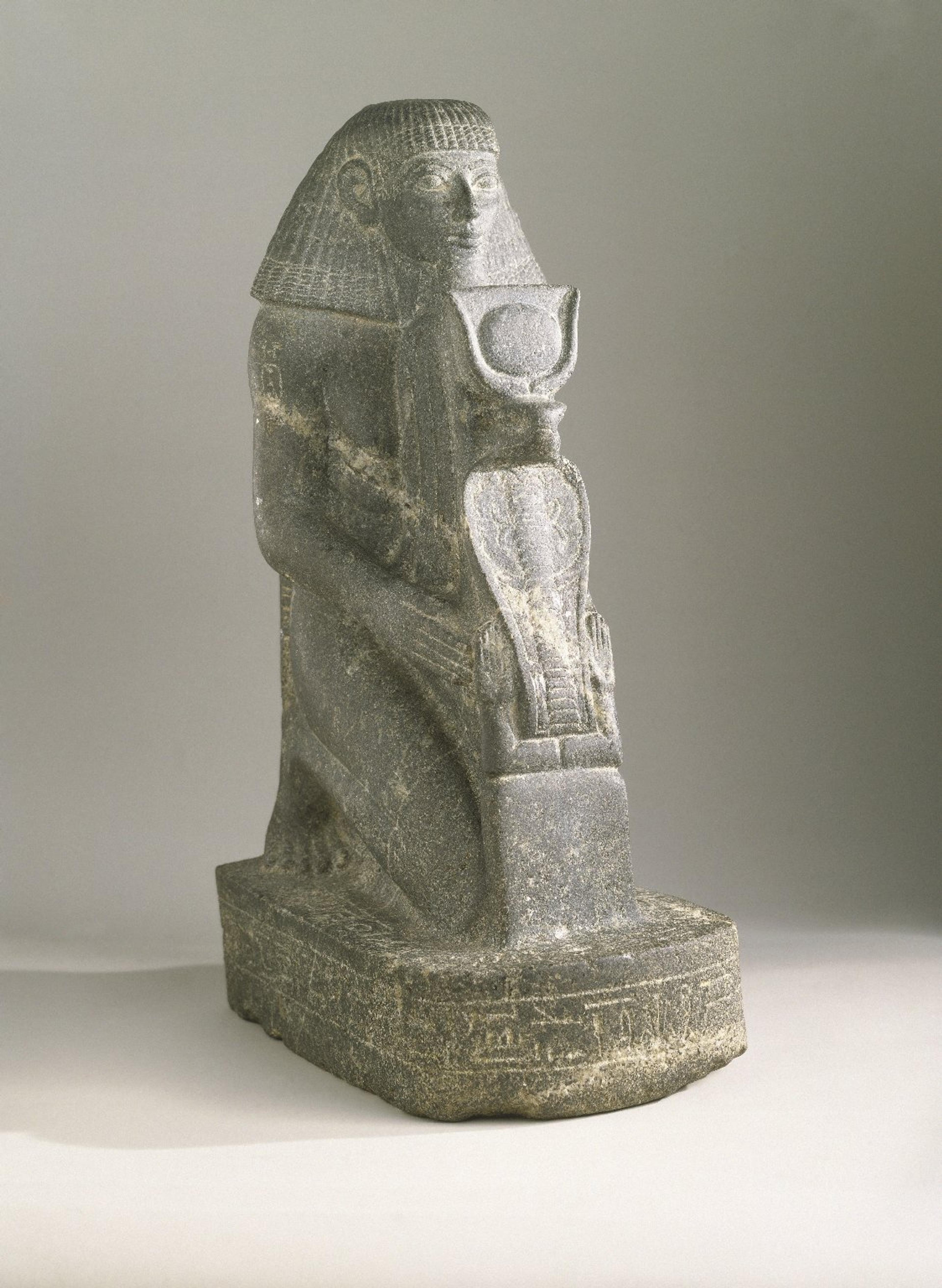 Kneeling Statue of Senenmut. Egypt, from Armant. New Kingdom, Dynasty 18, joint reign of Hatshepsut and Thutmose III, 1478–1458 B.C.E. Granite, 189⁄16 x 67⁄8 in. (47.2 × 17.4 cm), base: 63⁄4 x 215⁄16 x 119⁄16 in. (17.2 × 7.5 × 29.3 cm). Brooklyn Museum, Charles Edwin Wilbour Fund, 67.68