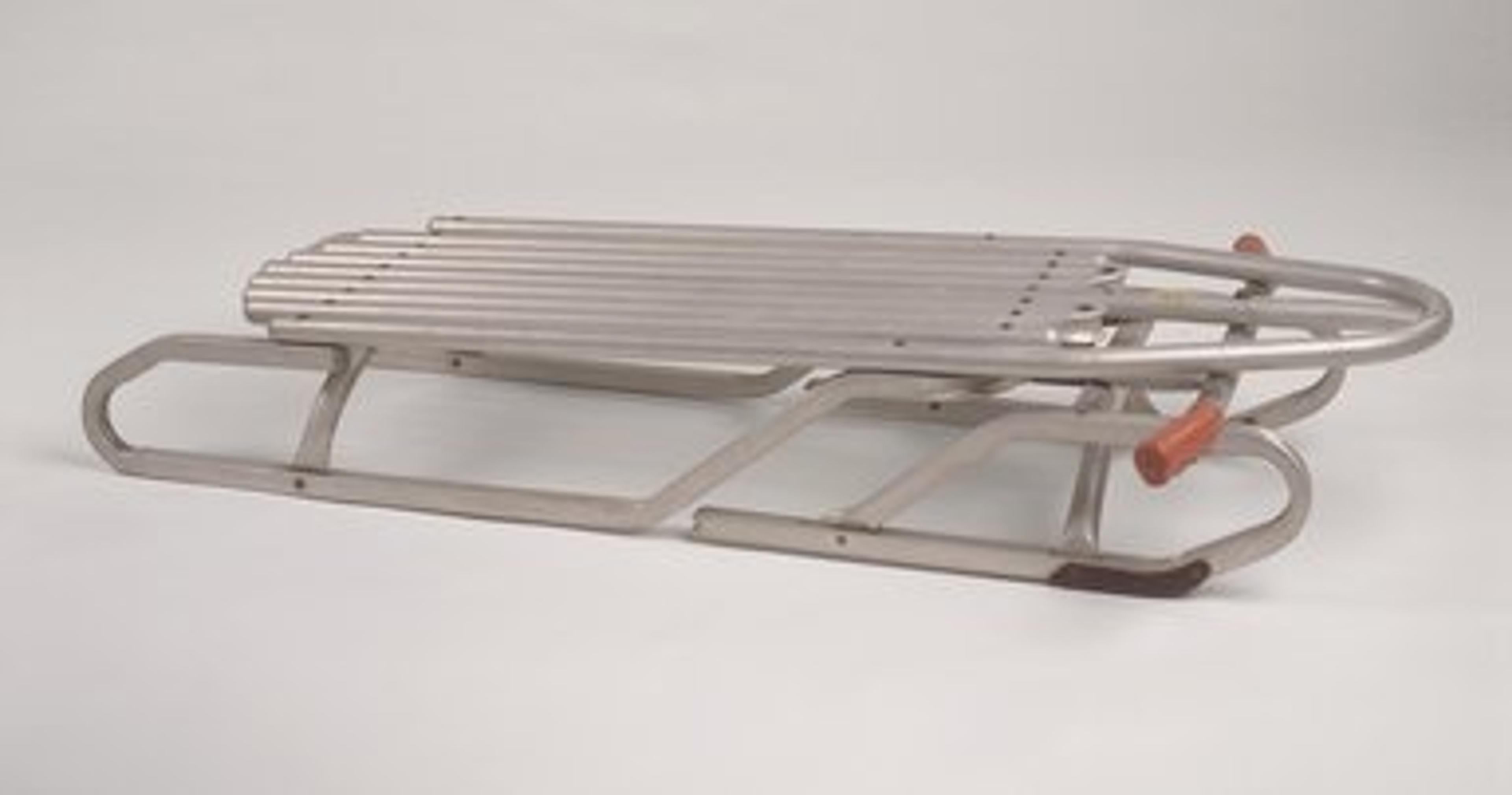 Bertram Lesser (American, born 1924). “Racer” Sled, patented March 30, 1965. Aluminum, rubber, other metals, 7 1/8 × 43 × 25 in. (18.1 × 109.2 × 63.5 cm). Brooklyn Museum; Gift of M. Christmann Zulli and David J. Ramsay, 2003.86. Creative Commons-BY. (Photo: Brooklyn Museum, 2003.86.jpg)