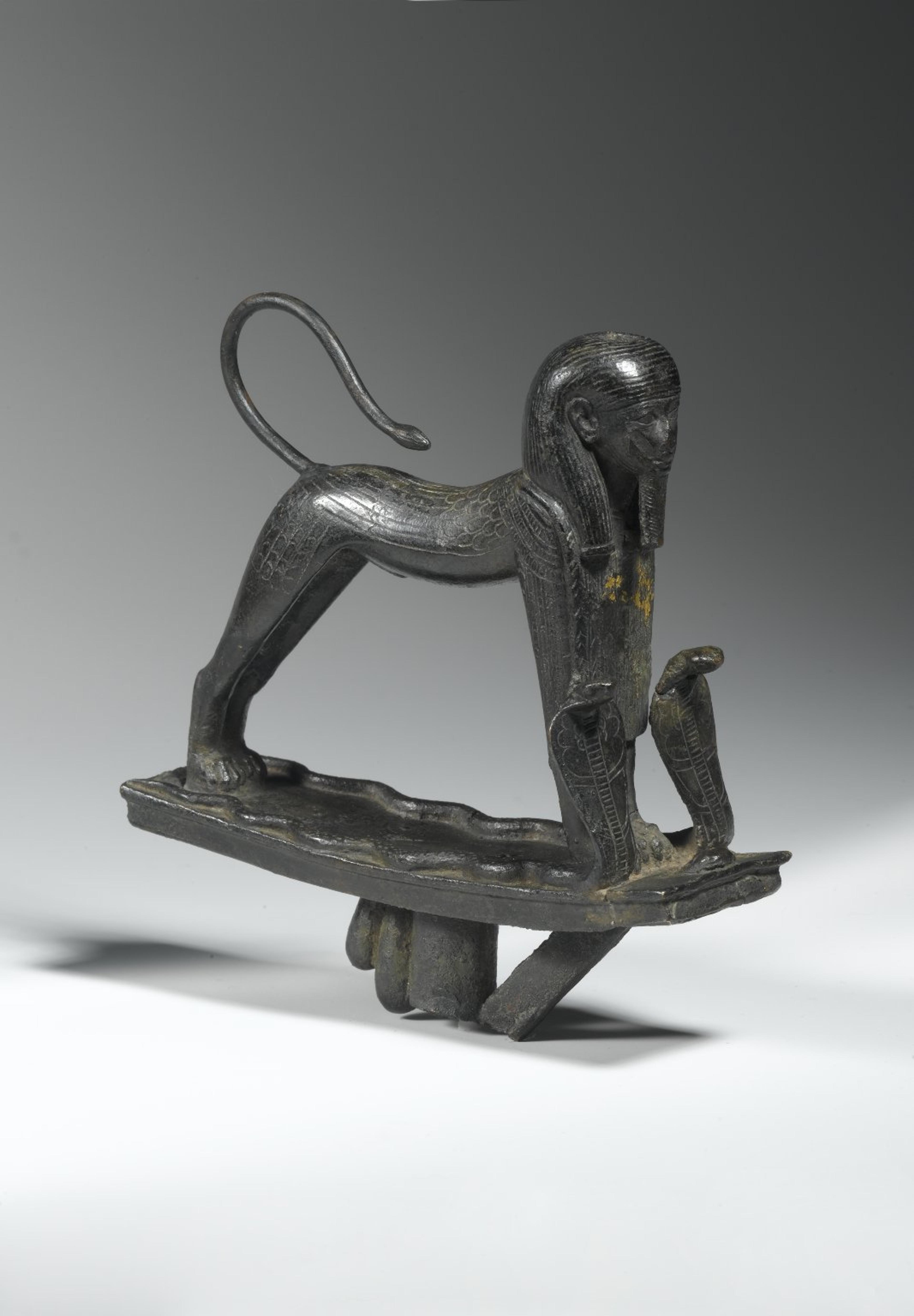 Striding Sphinx Finial. From Egypt. Third Intermediate Period, Dynasty 22 to Dynasty 24, circa 945–712 B.C.E. Bronze, 51⁄2 x 15⁄8 x 5 in. (14 × 4.1 × 12.7 cm). Brooklyn Museum, Charles Edwin Wilbour Fund, 61.20