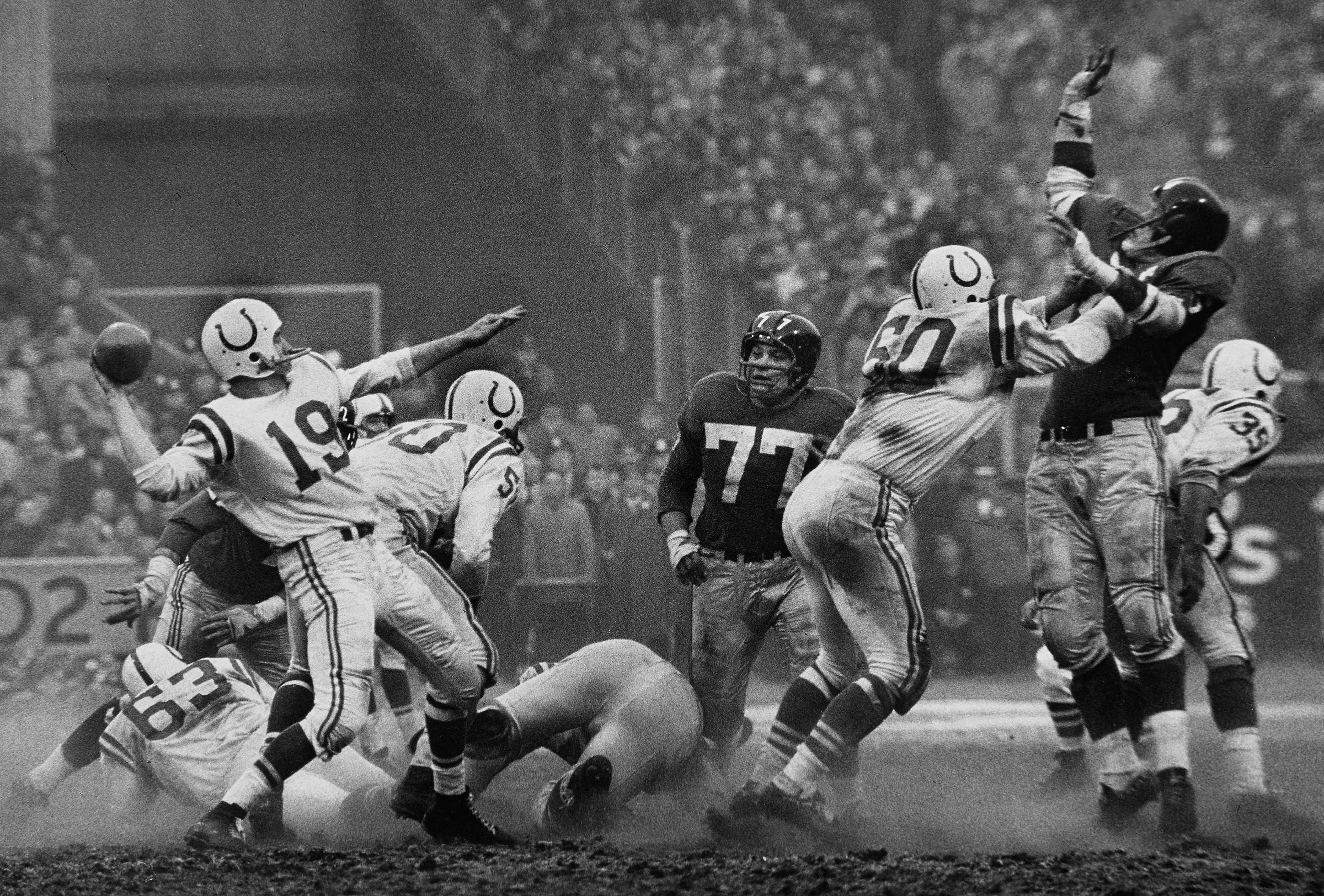 Robert Riger (American, 1924–1995). The Golden Arm, Johnny Unitas, 1958. Gelatin silver print, 123⁄4 x 181⁄4 in. (32.4 x 46.4 cm). Collection of the artist. © Robert Riger. Courtesy of the Robert Riger Living Trust