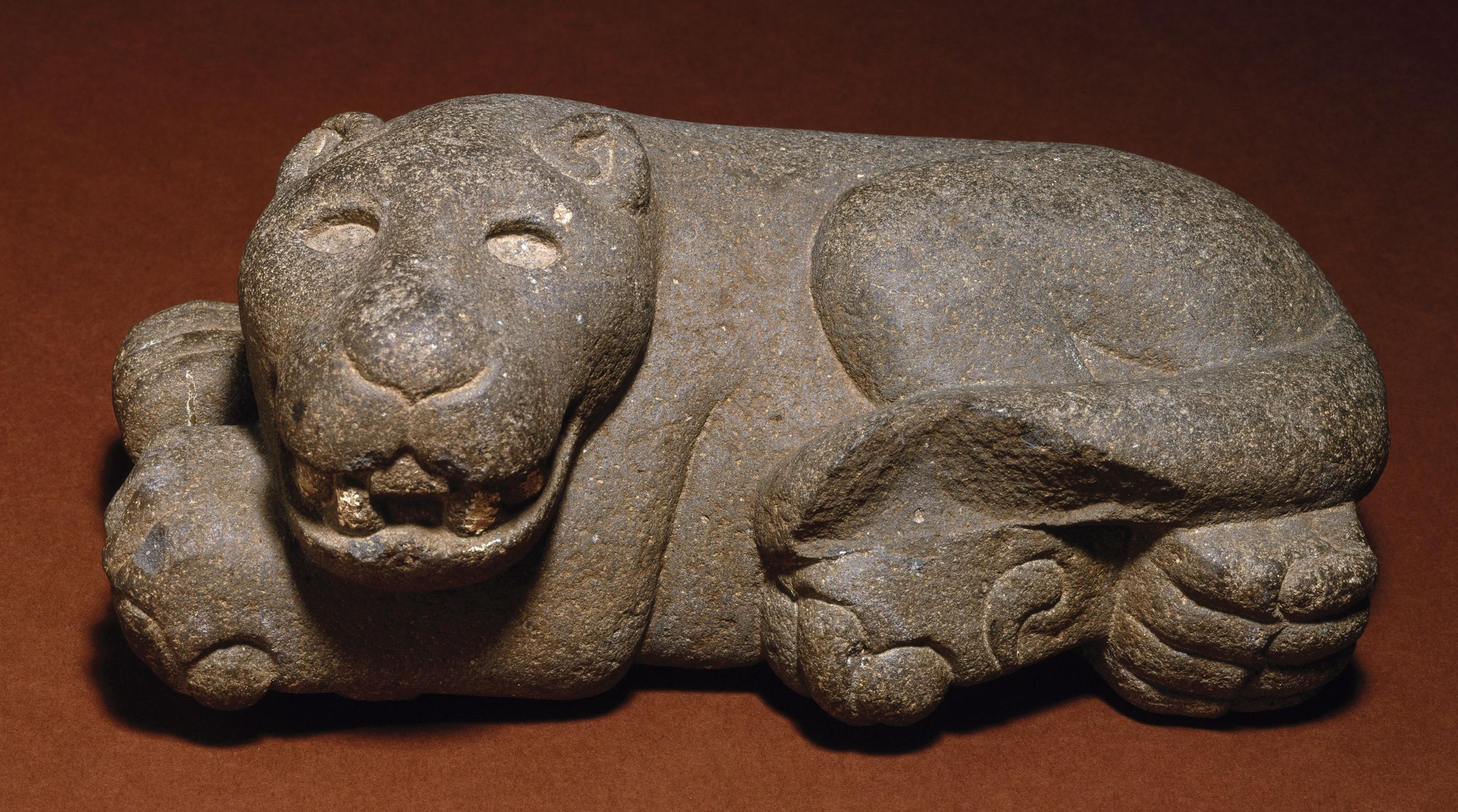 Aztec artist. Reclining Jaguar, 1400–1521. Volcanic stone, 5 × 11 × 53/4 in. (12.7 × 27.9 × 14.6 cm). Brooklyn Museum; Carll H. de Silver Fund, 38.45. Creative Commons-BY. (Photo: Brooklyn Museum)