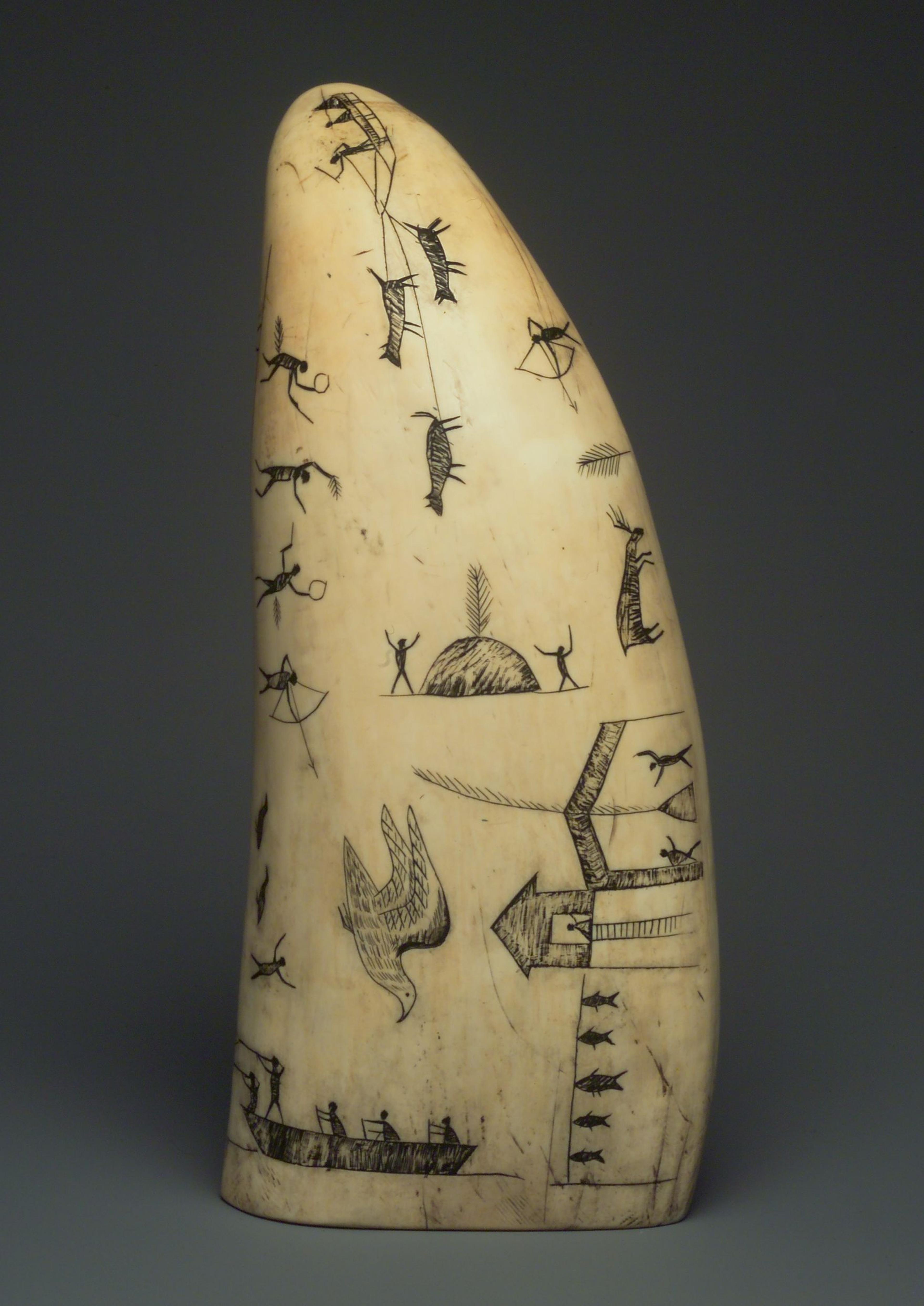 Alaska Native artist. Engraved Whale Tooth, late 19th century. Sperm whale tooth, black ash or graphite, oil, 61/2 × 3 × 2 in. (16.5 × 7.6 × 5.1 cm). Brooklyn Museum; Gift of Robert B. Woodward, 20.895. Creative Commons-BY. (Photo: Brooklyn Museum)