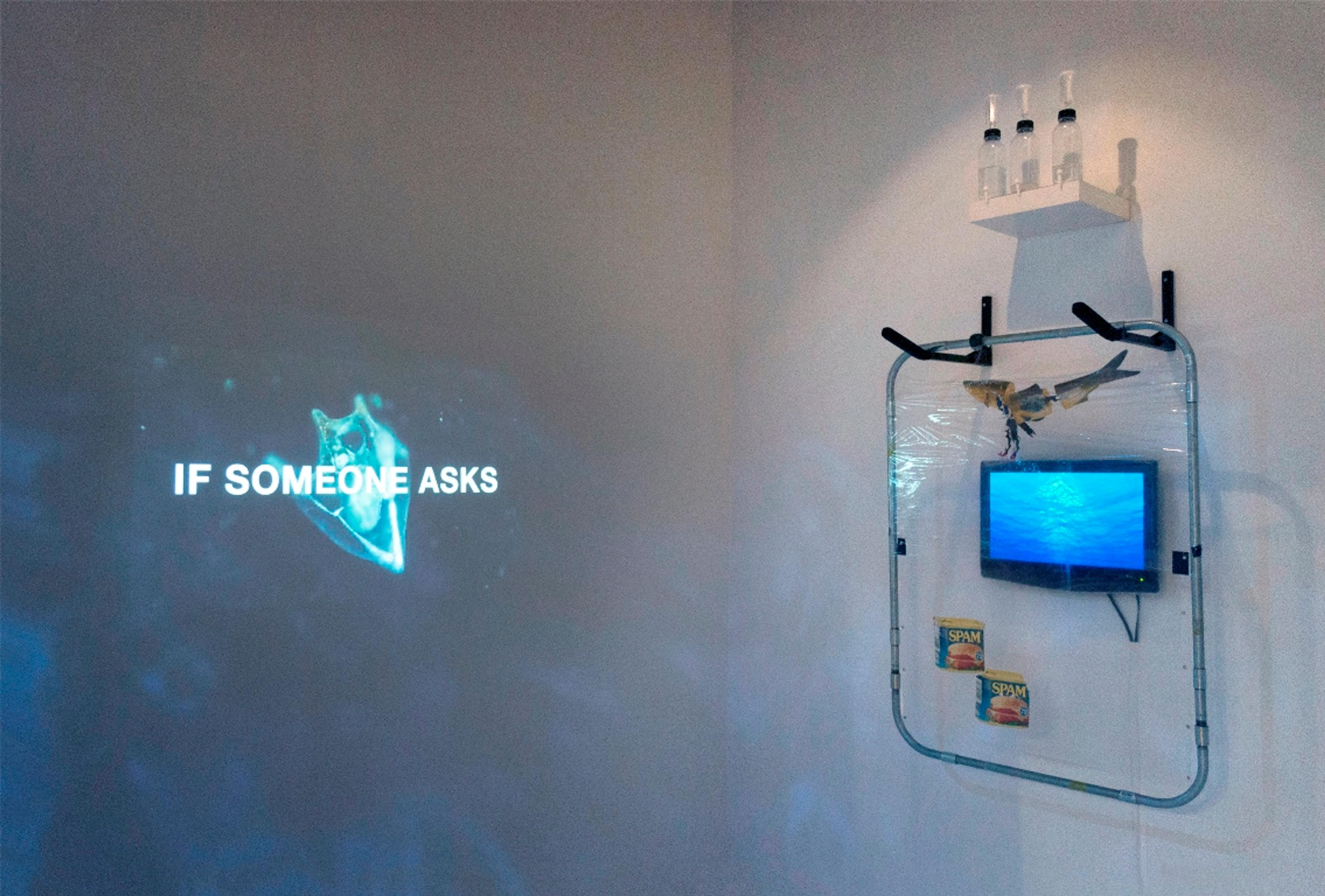 Son Kit. Anthropiscine War Machine (installation view), 2017. Two-channel video, galvanized steel, acetate, plastic film, silicone, acrylic transfer, PU fish, ASW-G-08 Gundam Barbatos (1st Form) model, air locks, glass, coarse salt, gochugaru (Korean pepper flakes), water, hardware. Dimensions variable. (Photo: Tiffany Jaeyeon Shin)