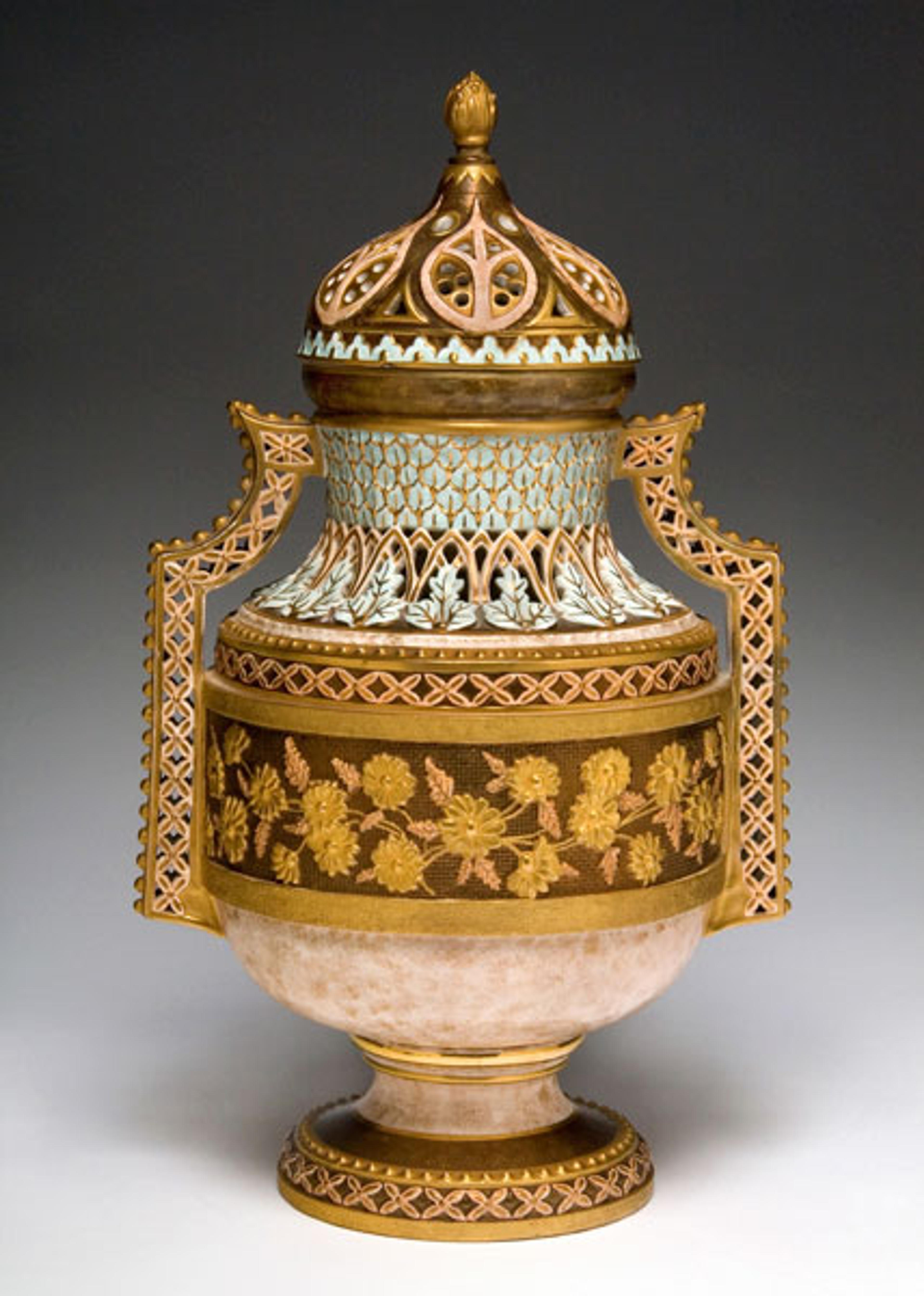 Edward Lycett (American, b. England, 1833–1910). Faience Manufacturing Company (1881–92). Covered Vase, circa 1887. Cream-colored earthenware painted over ivory glazed and luster ground with polychrome enamels and flat gold decoration. Lora Robins Gallery of Design from Nature, University of Richmond Museums, Gift of Emma and Jay Lewis, R2011.01.01