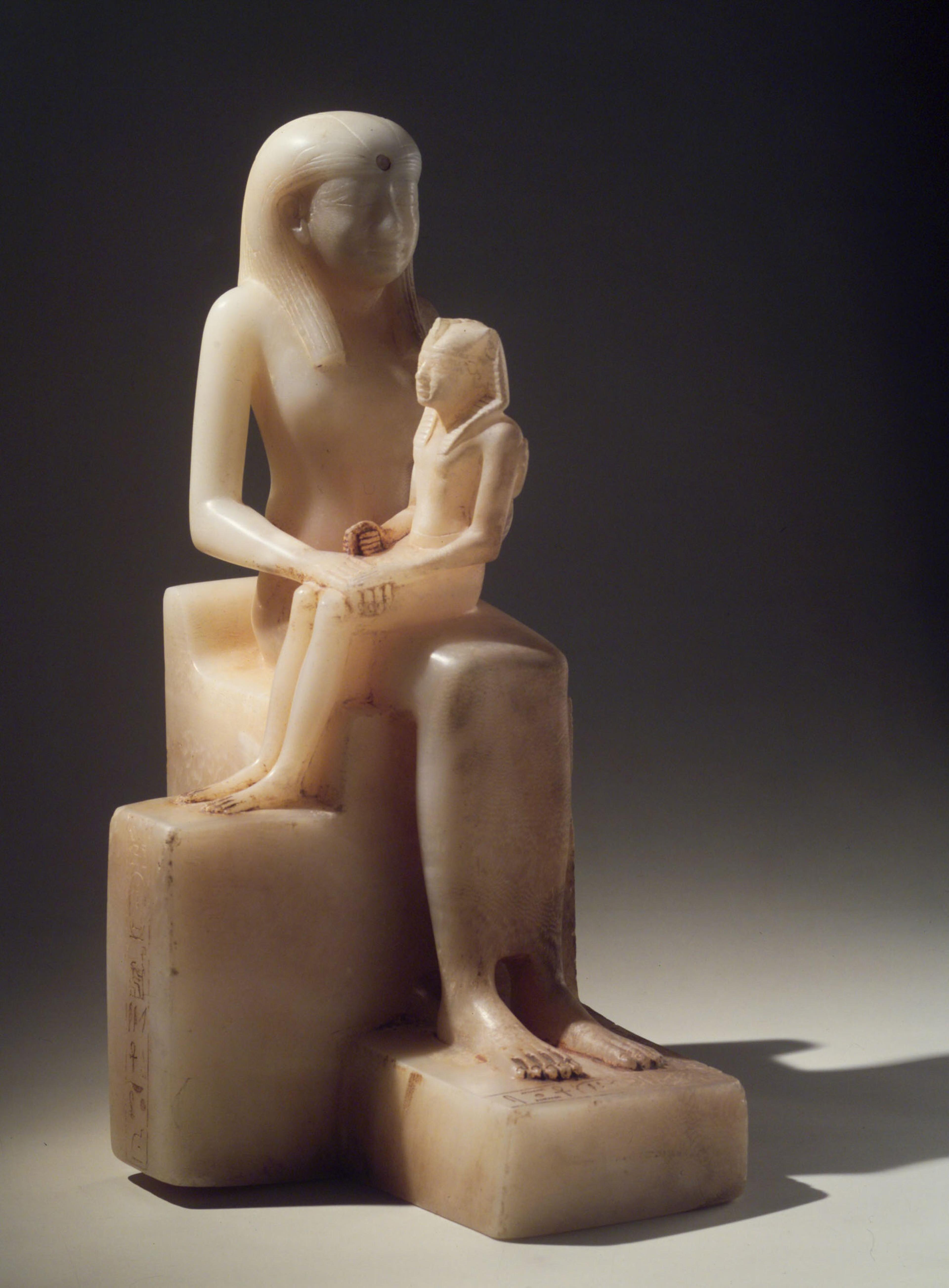 Statuette of Queen Ankhnes-meryre II and Her Son, Pepy II. Egypt, probably from Upper Egypt. Old Kingdom, Dynasty 6, reign of Pepy II, circa 2288–2224/2194 B.C.E. Egyptian alabaster, 157⁄16 x 913⁄16 in. (39.2 × 24.9 cm). Brooklyn Museum, Charles Edwin Wilbour Fund, 39.119