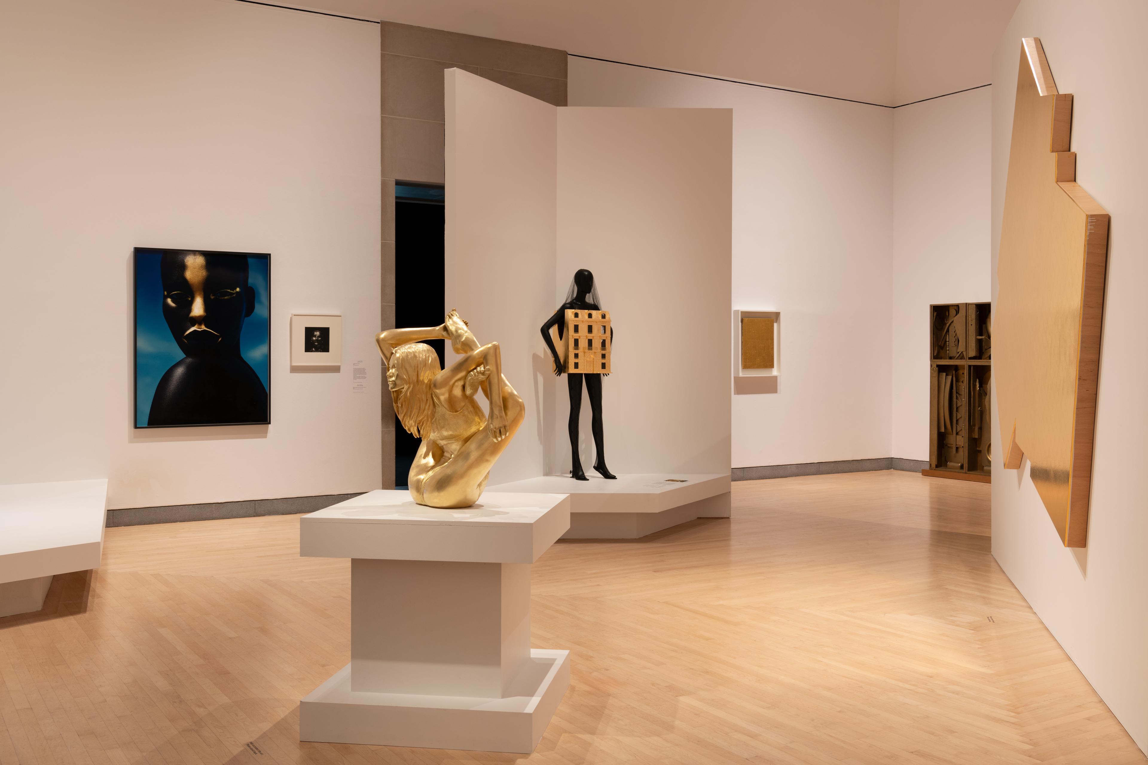 A view of sculpture and other works in Solid Gold