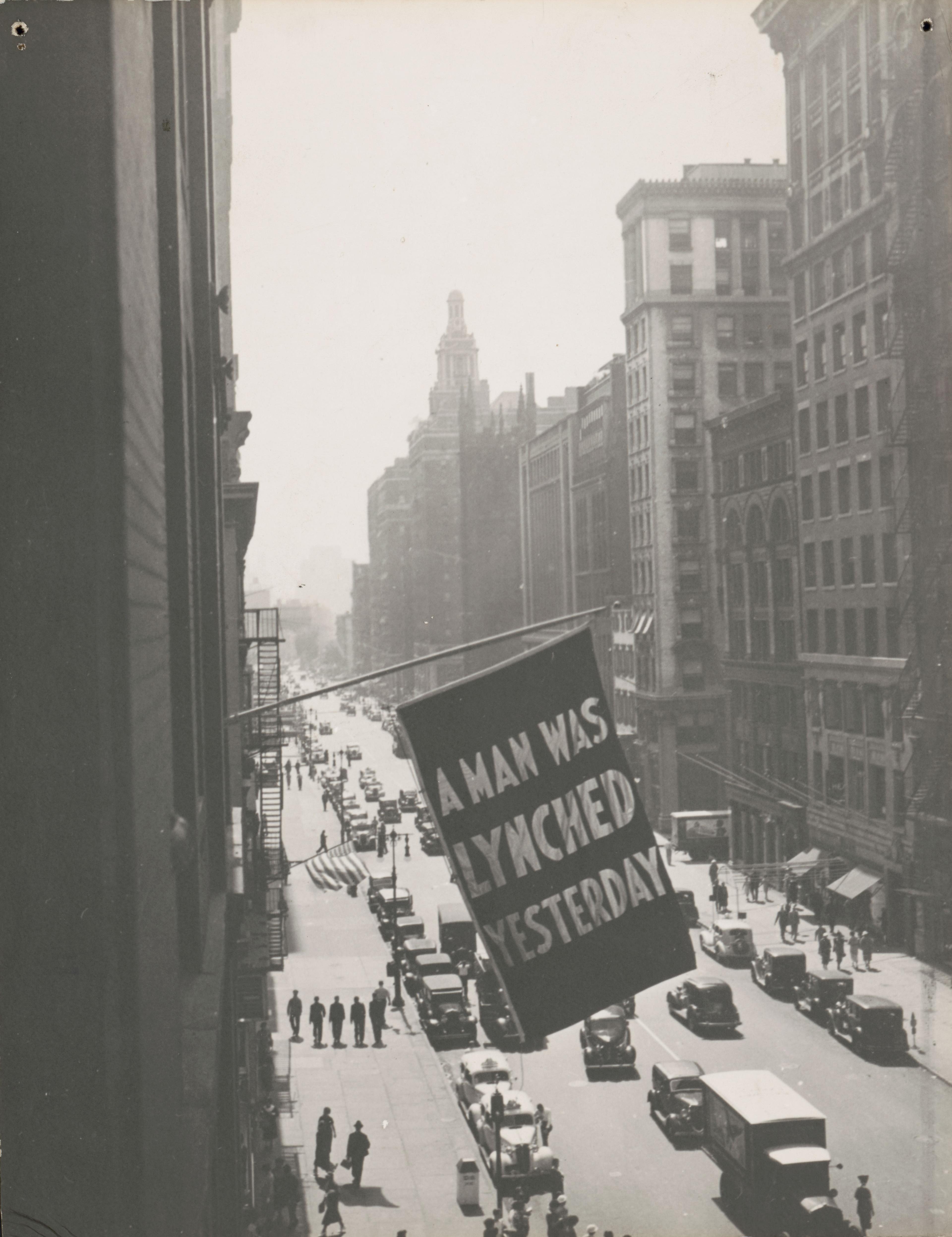 Flag, announcing lynching, flown from the window of the NAACP headquarters on 69 Fifth Ave., New York City, 1936. Photograph, 137⁄16 x 107⁄16 in. (34.1 x 26.5 cm). Prints and Photographs Division, Library of Congress, Washington, D.C, LC-DIG-ppmsca-39304. Courtesy of The Crisis Publishing Co., Inc., the publisher of the magazine of the National Association for the Advancement of Colored People, for material first published in The Crisis