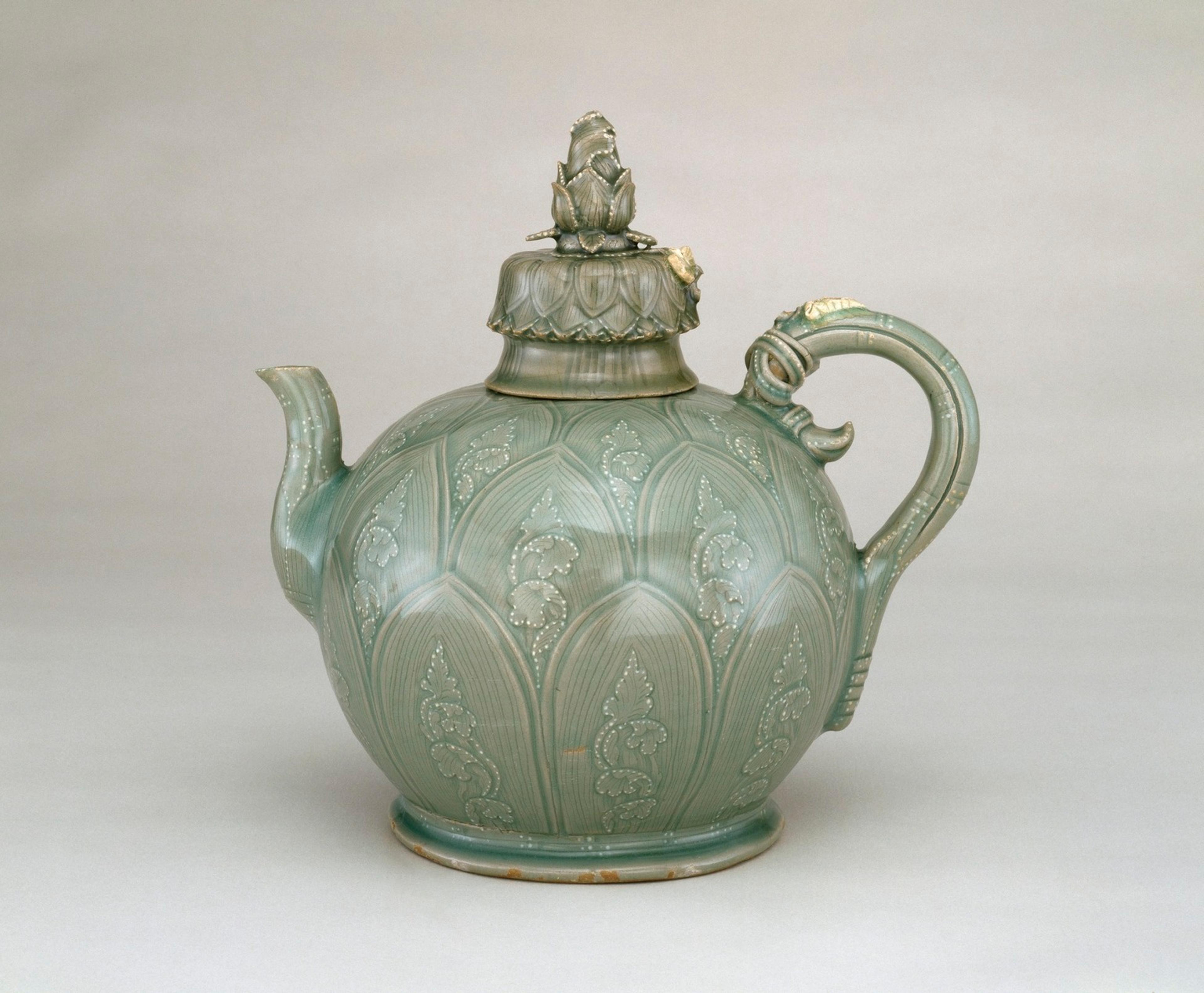 Ewer in the Shape of a Lotus, first half 12th century. Carved stoneware with underglaze slip decoration and celadon glaze. Brooklyn Museum; Gift of Mrs. Darwin R. James III, 56.138.1a-b. (Photo: Brooklyn Museum in collaboration with National Research Institute of Cultural Heritage, Daejon, Korea)