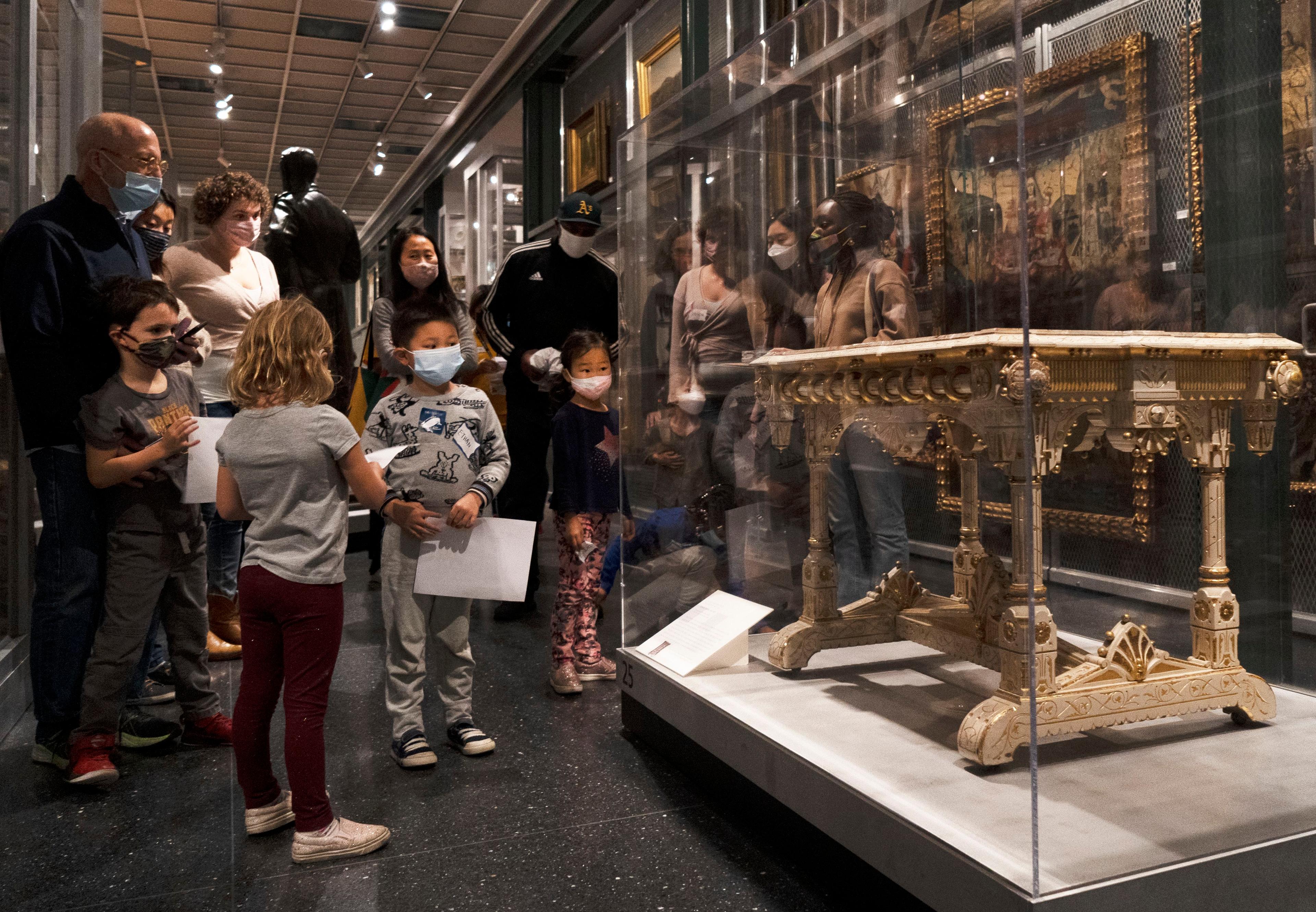 Families exploring the collection, 2021. (Photo: Faviola Lopez-Romani)
