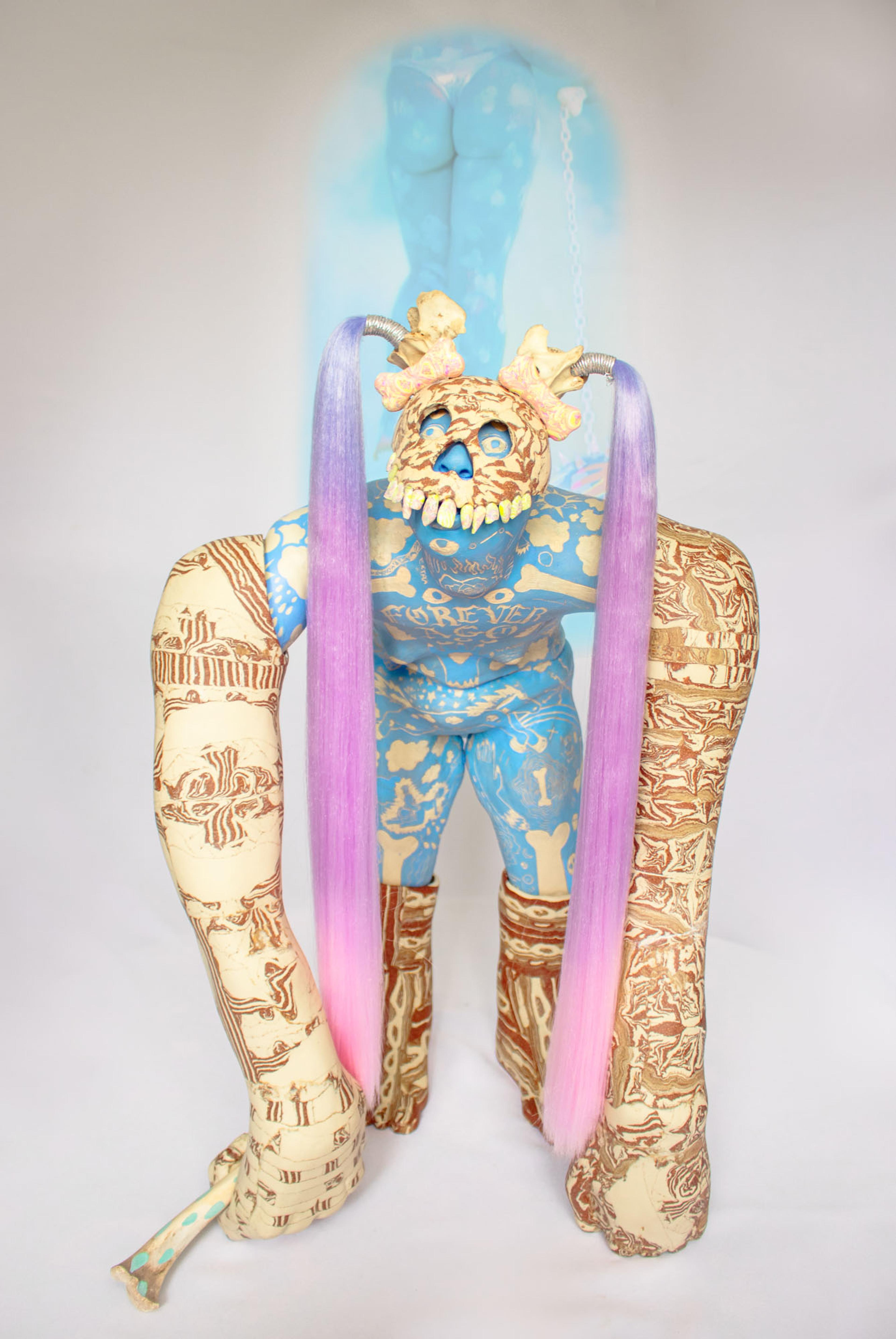 A surreal sculpture of a blue figure with elongated limbs and pink hair